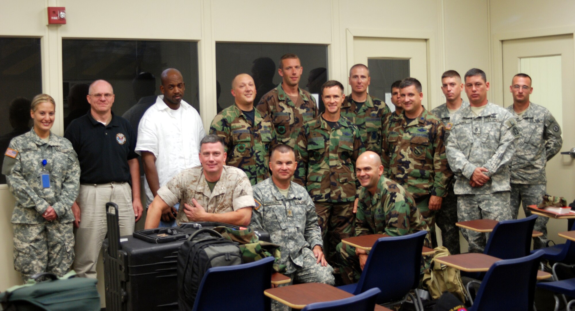 The Joint Assessment Team before they prepare to deploy to Puerto Rico in response to "Hurricane Dean" Aug. 16 here. The 16-member team will assess the area and decide how many personnel and assests are needed in the field.