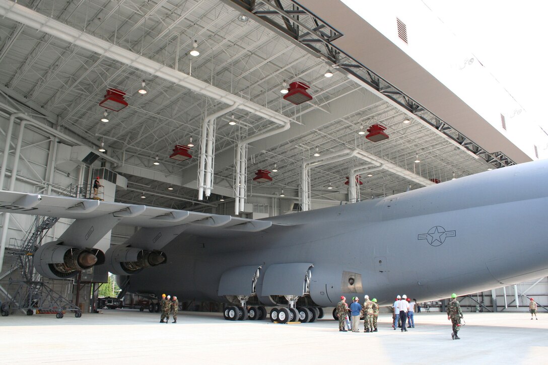WRIGHT-PATTERSON AFB, Ohio - The 445th Airlift Wing conducts a fit test for the C-5 Galaxy to ensure the aircraft fits appropriately inside the new Fuel System Maintenance Hangar August 15, 2007. The hangar is a tail-out, high bay fuel cell maintenance hangar.  It includes two 14 foot tall adjacent spaces for auxiliary functions, which include administrative and supervisory functions, a tool room, and space to house mechanical, electrical, and fire protection equipment. (U.S. Air Force photo/Mary Allen)