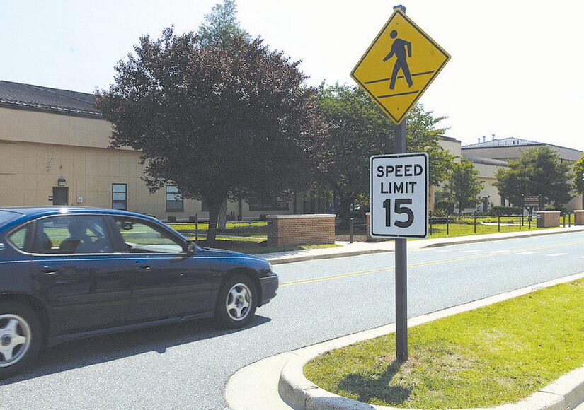 An Andrews driver enters the newly designated 15 mph zone on Alabama Avenue in front of the 744th Communications Squadon's building 1558. According to reports, there have been several near misses involving pedestrians at the crosswalks in this area as well on Menoher Drive. (U.S. Air Force/SSgt Tanika Belfield)