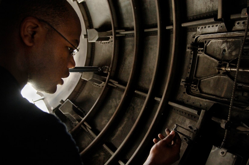 Airmen 1st Class Reginold Camp, 437th Maintenance Squadron jet engine technician, conducts part of the home station check inspection by going over a C-17 engine checklist here Aug. 9. (U.S. Air Force Photo/Airman 1st Class Nicholas Pilch)