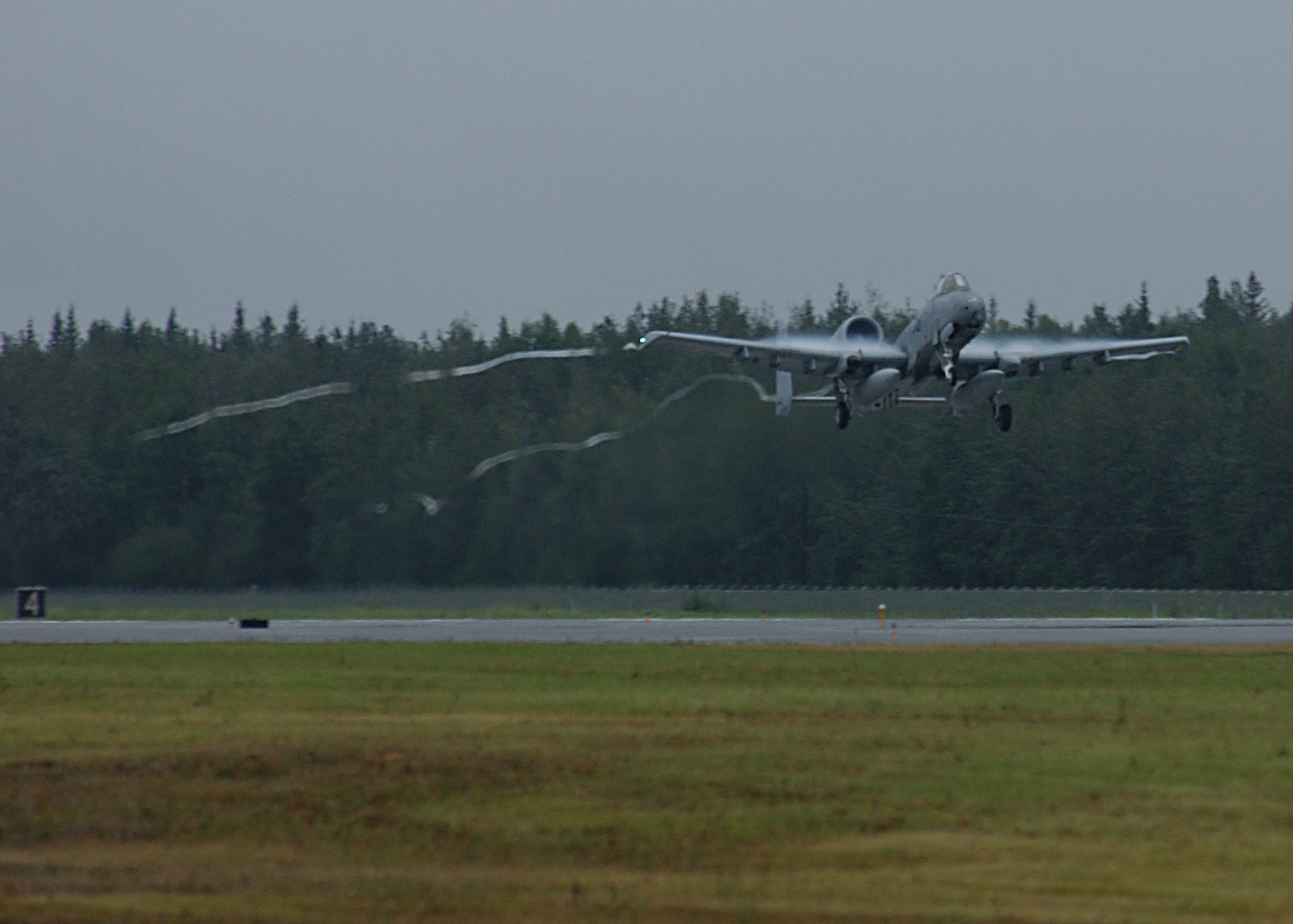EIELSON AIR FORCE BASE, Alaska -- An A-10 Thunderbolt II, 355th Fighter Squadron,  takes off for their final departure on August 15. The 355th FS has deployed twice to Bagram AB, Afghanistan, in support of Operation ENDURING FREEDOM within the past three years. In 2004, the unit deployed for approximately six months, flew more than 2,000 combat sorties and logged more than 7,500 flying hours. During their last deployment to Bagram AB in 2006, which lasted for four months, the unit flew more than 1,500 combat sorties and 5,000 hours in the skies over Afghanistan. (U.S. Air Force Photo by Airman 1st Class Jonathan Snyder)(Released)