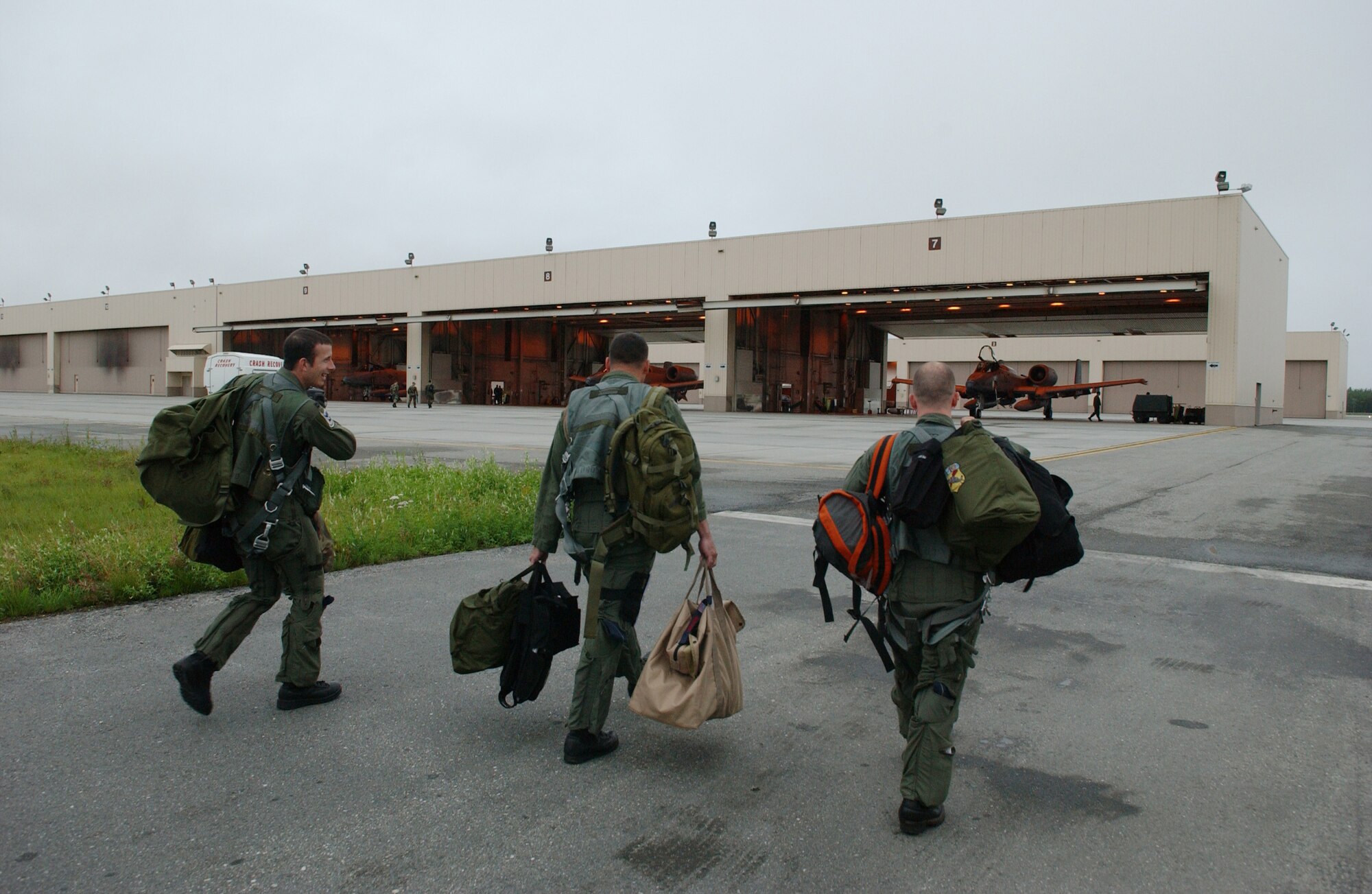 EIELSON AIR FORCE BASE, Alaska -- Capt. Dale Stark (Right), Lt. Col. Kevin Blanchard (Middle), Capt. Sean Hall (Left), all of the 355th Fighter Squadron, step to their A-10 Thunderbolt II aircraft prior to their final departure Aug. 15. The 355th FS has deployed twice to Bagram AB, Afghanistan, in support of Operation ENDURING FREEDOM within the past three years. In 2004, the unit deployed for approximately six months, flew more than 2,000 combat sorties and logged more than 7,500 flying hours. During their last deployment to Bagram AB in 2006, which lasted for four months, the unit flew more than 1,500 combat sorties and 5,000 hours in the skies over Afghanistan. (U.S. Air Force Photo by Airman 1st Class Jonathan Snyder)(Released)