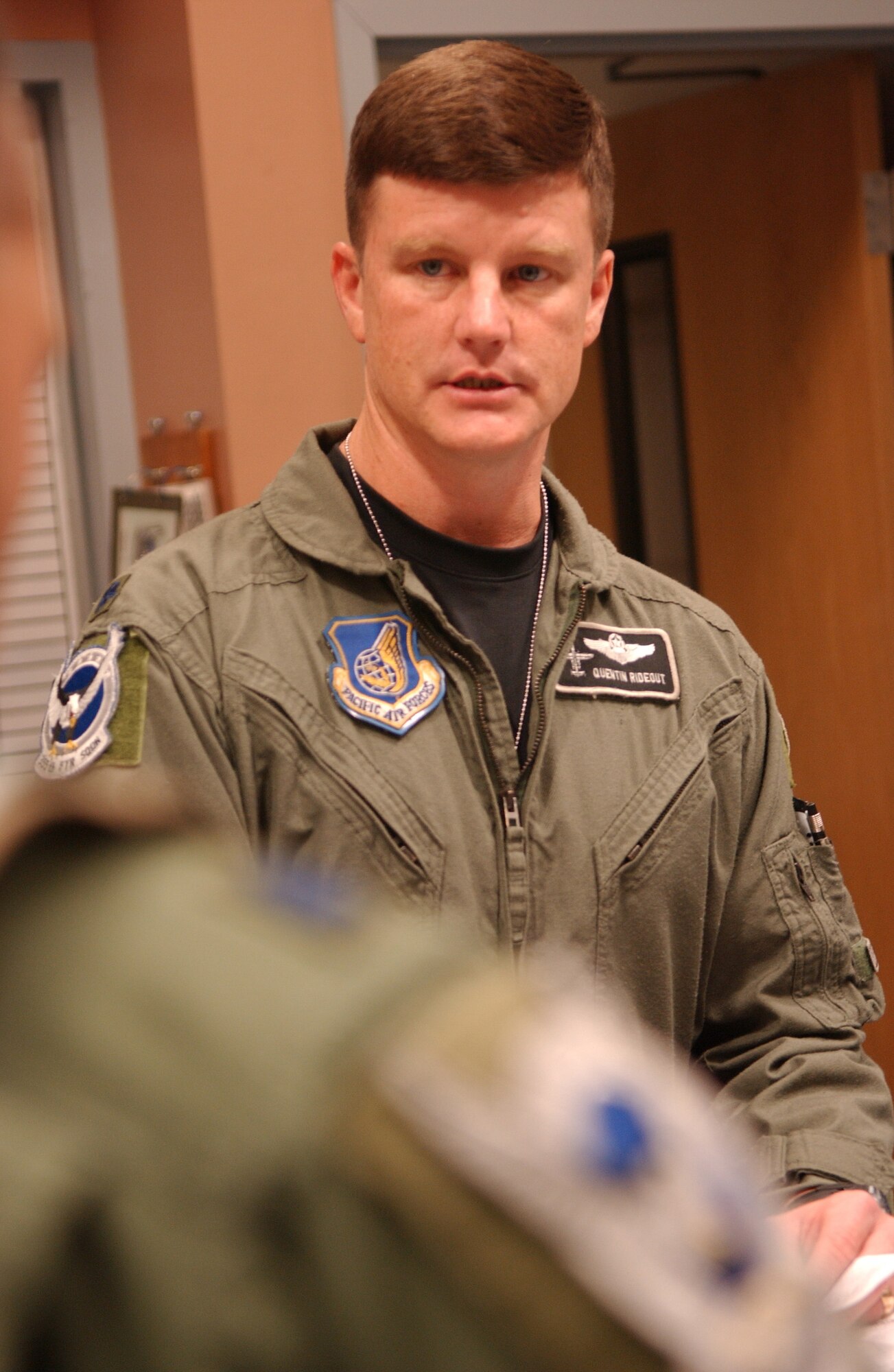 EIELSON AIR FORCE BASE, Alaska -- Lt. Col. Quentin Rideout, 355th Fighter Squadron commander, talks with the pilots of the 355th Fighter Squadron one last time before their final departure of the A-10 Thunderbolt II Aug. 15. The first two A-10s arrived at Eielson Dec. 18, 1981; the last two A-10s left today for Moody AFB, Ga., and Gowen Field, Idaho. (U.S. Air Force Photo by Airman 1st Class Jonathan Snyder)(Released)