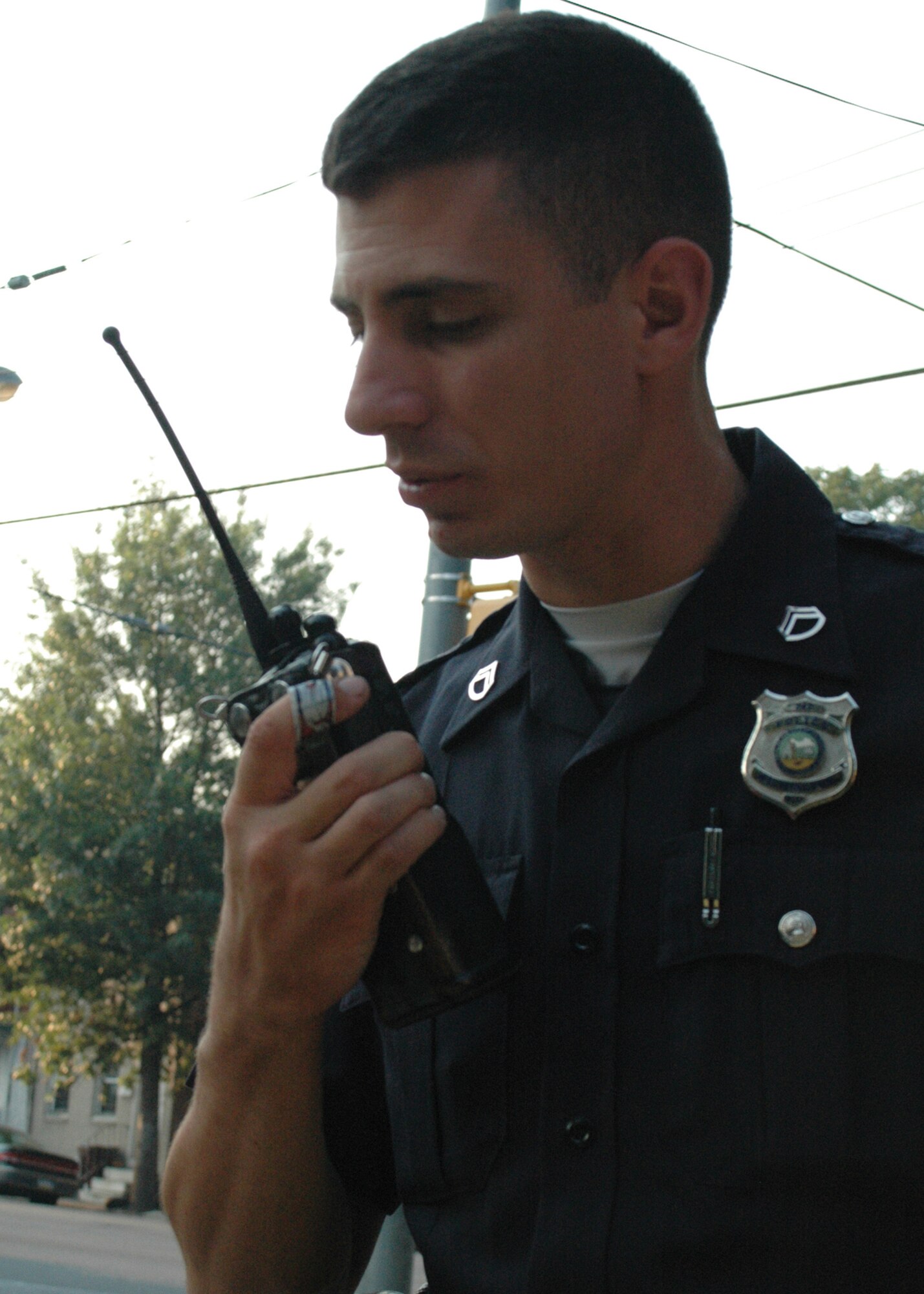 DOVER AIR FORCE BASE, Del. -- Wilmington Police Officer Corporal Thomas Ragonese uses his background in children's mental health advocacy when responding to calls of children and adolescences displaying criminal behavior. He is also a technical sergeant in the Air Force Reserve's 512th Airlift Wing here where he works as a first sergeant in the 512th Airlift Control Flight. (U.S. Air Force photo/Senior Airman Andria Allmond) 