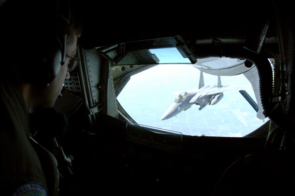 GRAND FORKS AIR FORCE BASE, N.D. -- A KC-135 stratotanker prepares to refuel an F-15 Eagle over the midwest August 13. (U.S. Air Force photo/Airman 1st Class Chad Kellum)