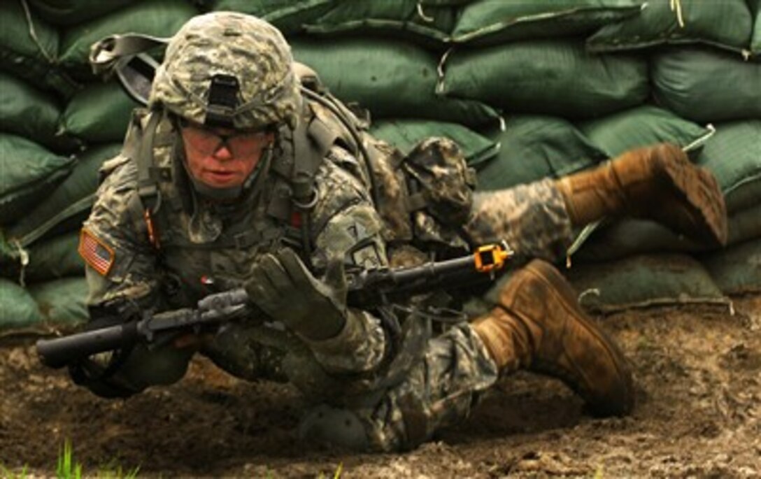 A U.S. Army soldier of Charlie Company, 2nd Battalion, 200th Infantry Battalion, New Mexico Army National Guard, maneuvers through an obstacle during individual movement techniques as part of mobilization training at Fort Dix, N.J., Aug. 7, 2007.The unit is preparing for an upcoming deployment in support of Operation Iraqi Freedom.