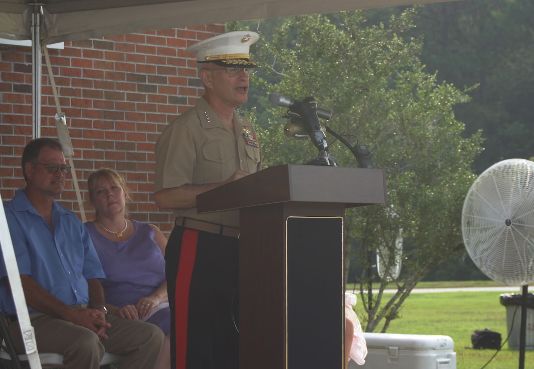 KINGS BAY, Ga. (Aug. 17, 2007)- General Robert Magnus, assistant commandant of the Marine Corps, speaks to family, friends and fellow Marines and sailors of Cpl. Jason Dunham, a Medal of Honor recipient for heroic actions in support of Operation Iraqi Freedom, during the Marine Corps Security Force Company, Kings Bay, Ga., barracks dedication to Dunham here, Aug. 17. Dunham was stationed here from 2001-2003. (Official U.S. Marine Corps photo by Cpl. Lucian Friel (RELEASED)