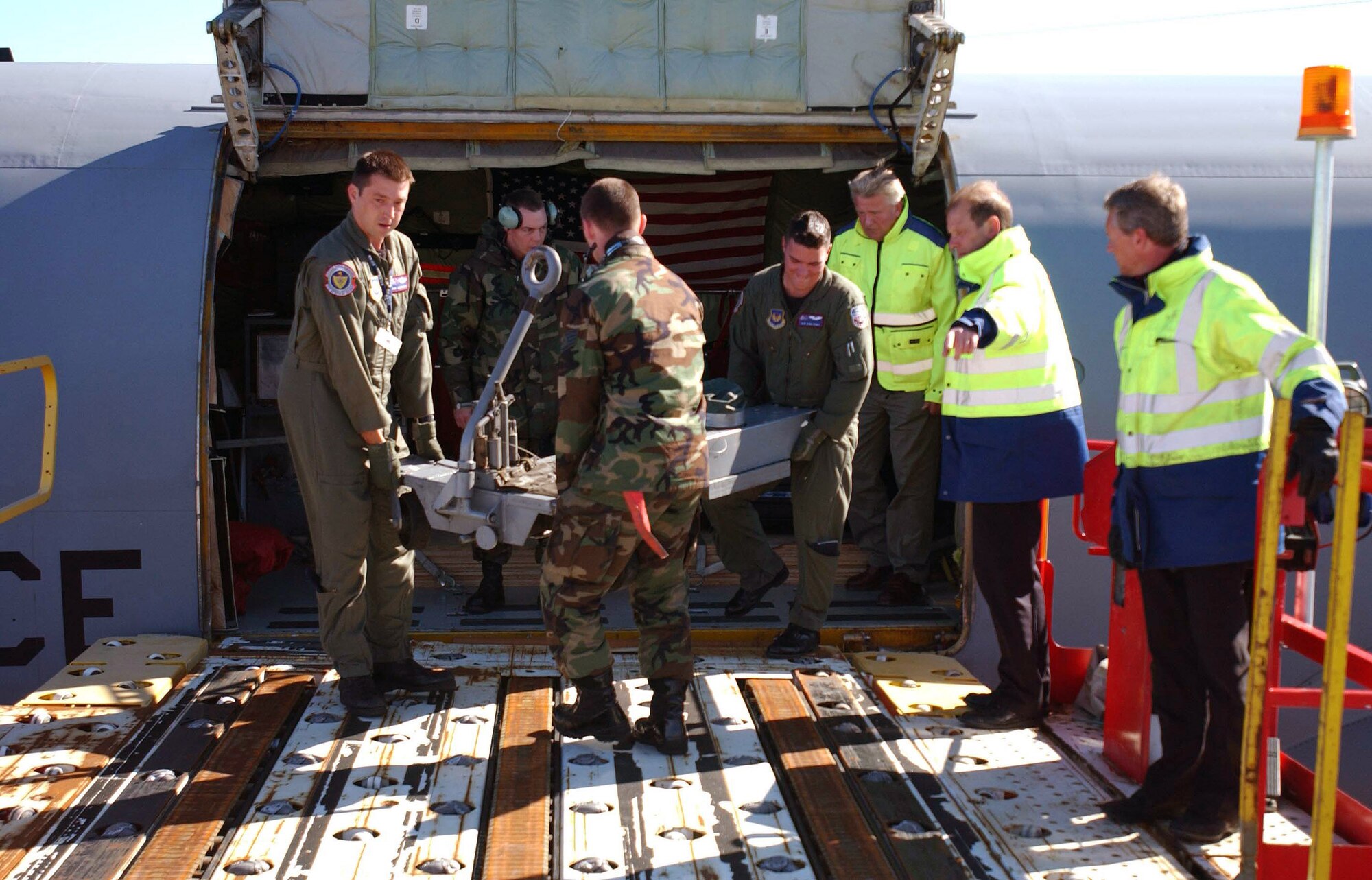 Members of the 100th Air Refueling Wing unload an aircraft jack from a KC-135 Stratotanker in preparation for Northern Viking 2007 Aug. 13 at Keflavik Airport, Iceland. Thirteen aircraft and one patrol frigate from six nations are participating in the exercise. (U.S. Air Force photo/Tech. Sgt. J. LaVoie) 
