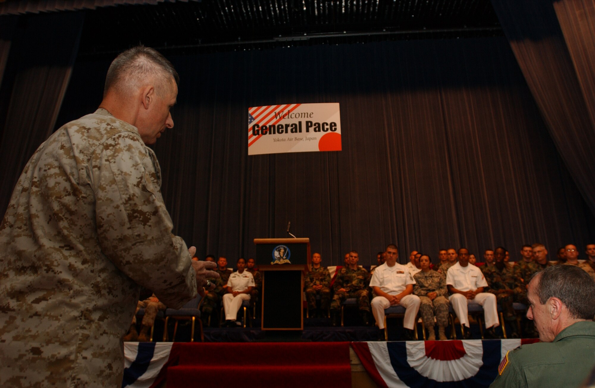 YOKOTA AIR BASE, JAPAN - General Peter Pace, Chairman of the Joint Chiefs of Staff, answers questions from service members stationed at various bases in Japan during a Yokota Air Base Town Hall meeting on August 17, 2007.(U.S. Air Force photo by Airman First Class Jonathan Fowler)