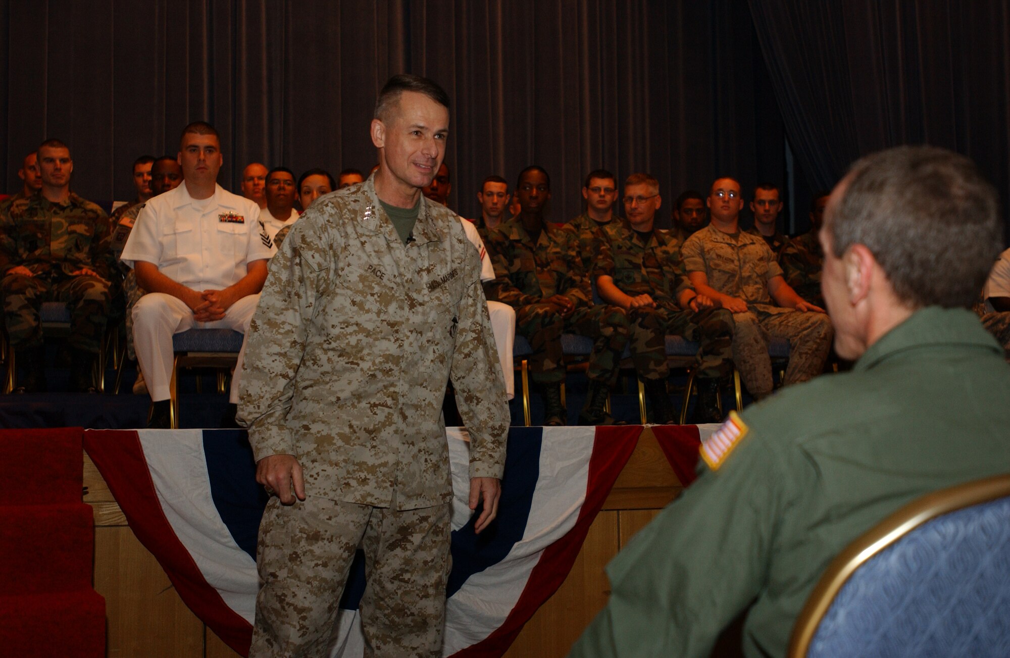 YOKOTA AIR BASE, JAPAN - General Peter Pace, Chairman of the Joint Chiefs of Staff, answers questions from service members stationed at various bases in Japan during a Yokota Air Base Town Hall meeting on August 17, 2007.(U.S. Air Force photo by Airman First Class Jonathan Fowler)