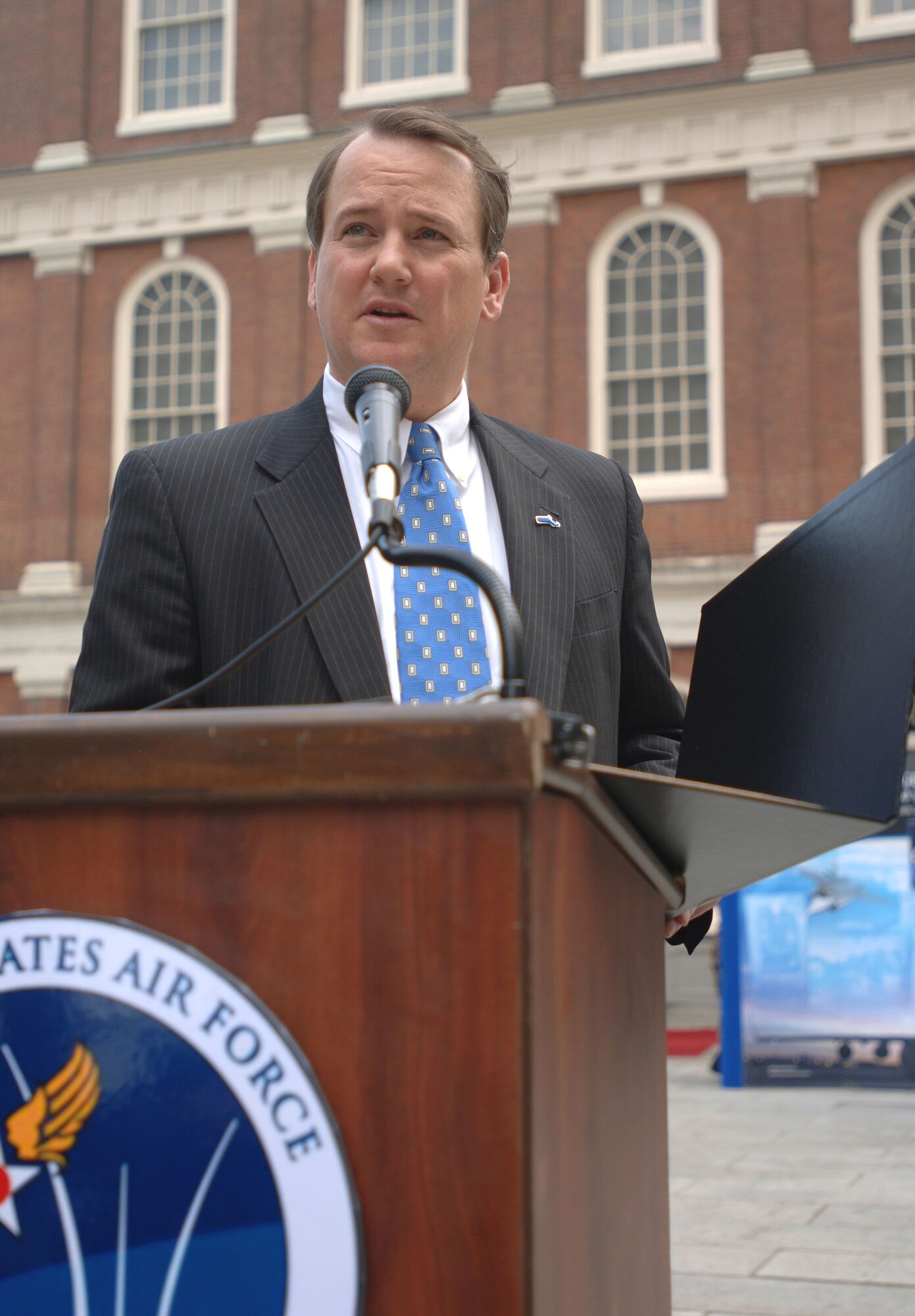 Massachusetts Lt. Gov. Timothy P. Murray reads a proclamation signed by Gov. Deval Patrick during a ceremony recognizing Air Force Week New England in front of historic Faneuil Hall in downtown Boston Aug. 17. (U.S. Air Force photo/Staff Sgt. Bennie J. Davis III)