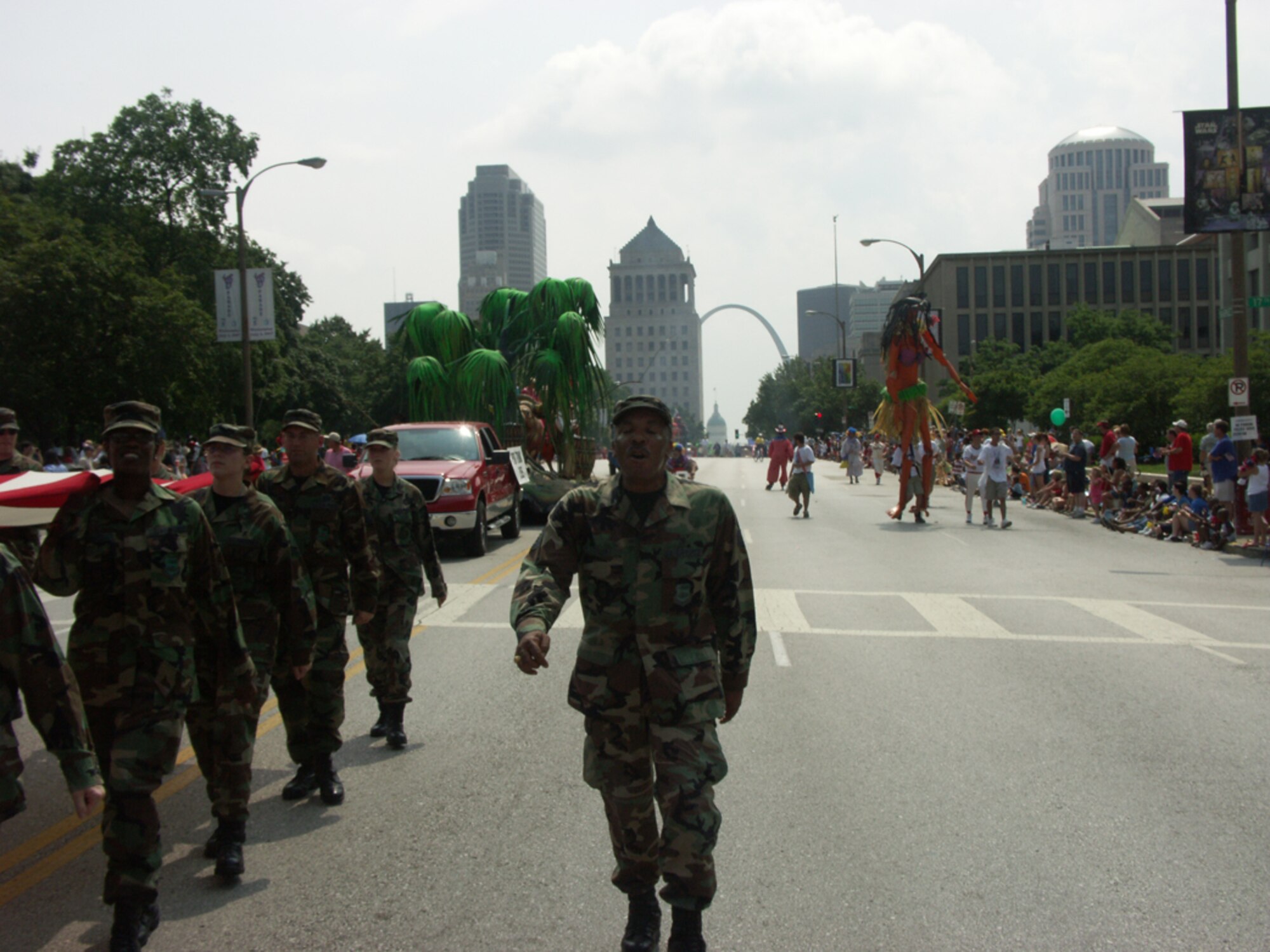 The Gateway to the West, the St. Louis Arch, looms behind as the 932nd Airlift Wing marches in the Independence Day 2007 parade.  Photo/Tech Sgt. Dan Oliver