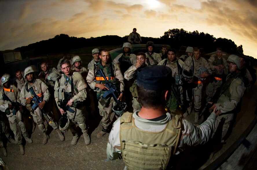 SSgt Wayne Tokarz, BC 3 instructor, briefs troops on what to expect when a combat convoy gets under way. (photo by Tech. Sgt. Matthew Hannen)