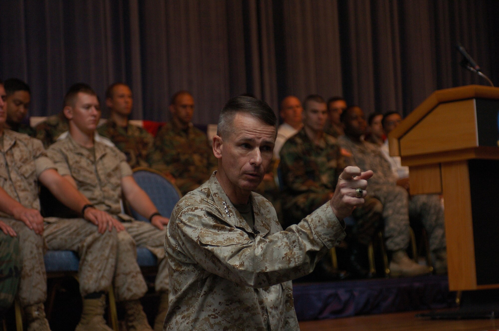 YOKOTA AIR BASE, Japan--General Peter Pace, Chairman of the Joint Chiefs of Staff, answered service members questions during a Town hall meeting held at Yokota Air Base, Japan on 17 August 2007. Service members from all around Japan came to hear General Pace respond to various Department of Defense related questions. (USAF Photo by Amn Leandra D. Hernandez) NOT RELEASED