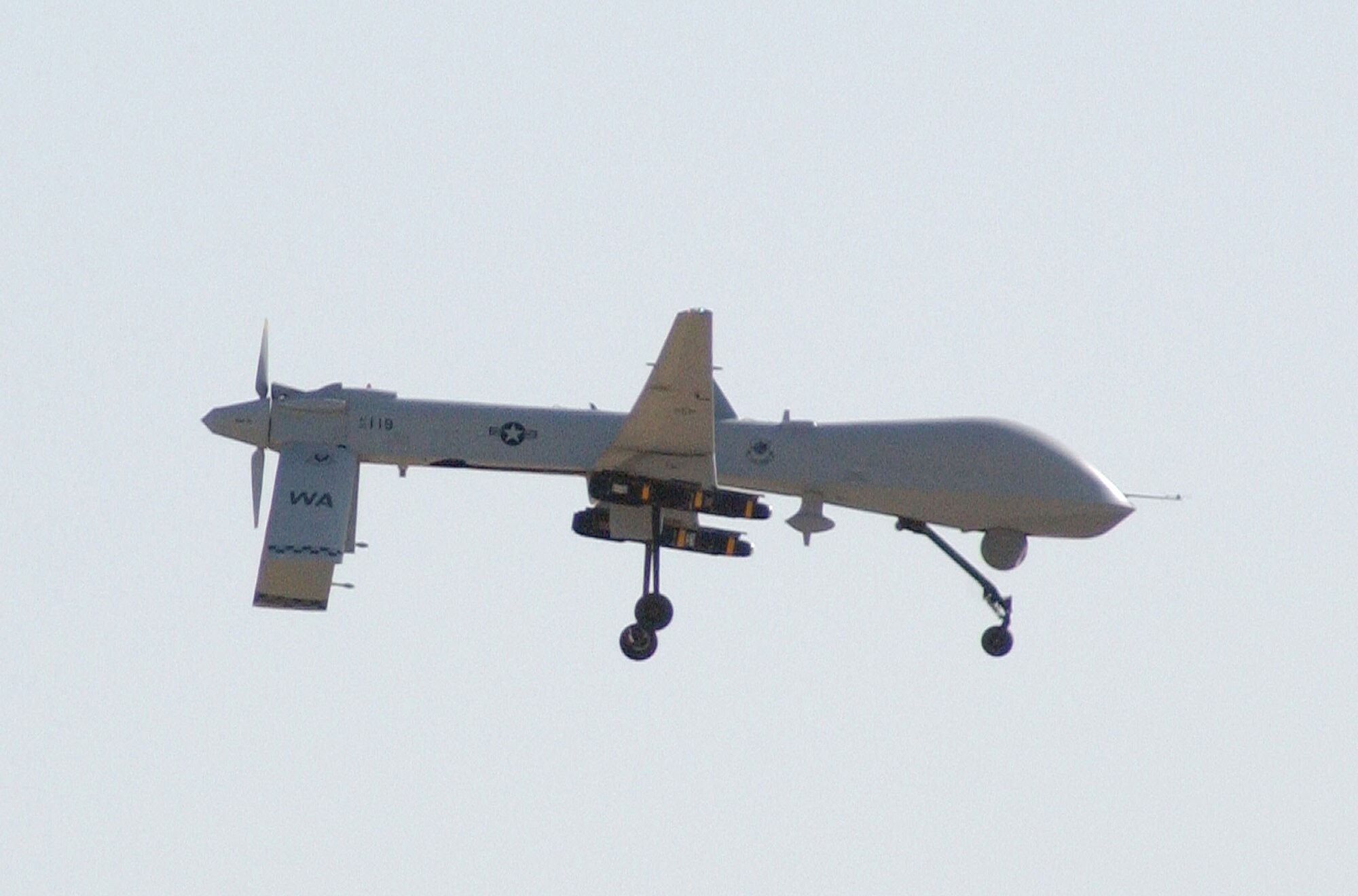 An MQ-1B Predator unmanned aerial vehicle prepares to land at Balad Air Base, Iraq, after a combat mission in support of Operation Iraqi Freedom. Predator aircraft fly intelligence, surveillance and reconnaissance missions in Iraq and Afghanistan. Air Force Predator missions contributed to the 28 ISR missions flown Aug. 18.  (U.S. Air Force photo/Senior Airman Olufemi A. Owolabi)
