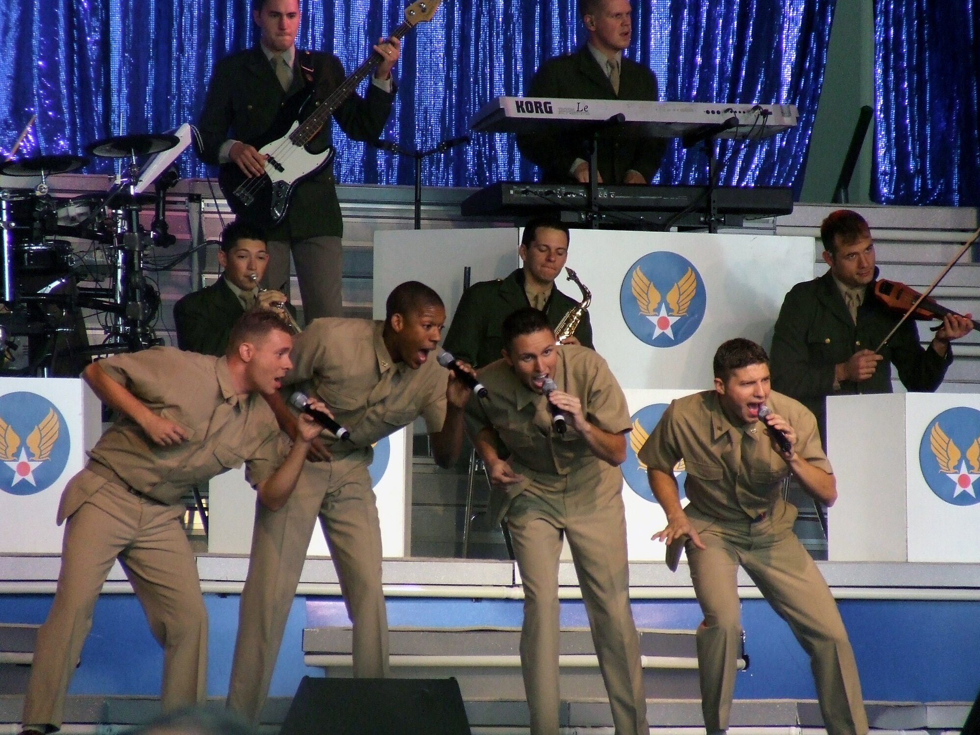 Performers with the U.S. Air Force entertainment showcase, Tops in Blue, play a number during a show at McGuire Air Force Base, N.J., Aug. 14, 2007.  The 2007 edition of Tops in Blue is themed on the 60th anniversary of the Air Force.  (U.S. Air Force Photo/Tech. Sgt. Scott T. Sturkol)