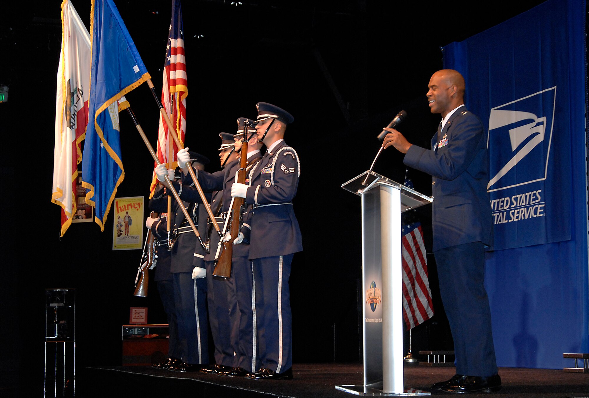 Lt. Col. Ivan Thompson, SMC, and an Honor Guard from March Air Reserve Base represented the Air Force at the unveiling of a stamp honoring actor Jimmy Stewart, Aug. 17. The ceremony, held at Universal Studios Hollywood, was attended by his daughters and son, and close family friend actor Robert Wagner. Stewart, who died in 1997, served in the Army Air Corps during World War II. He flew 20 missions over Germany as a B-24 squadron commander. He later served in the Air Force Reserve – achieving the rank of brigadier general. Recently, a technology center at Bolling Air Force Base in Washington, D.C. was dedicated as the Brig. Gen. James Stewart Theater in honor of his service and his efforts to promote Air Force heritage and moral programs to  benefit future generations of Airmen. (Photo by Joe Juarez)