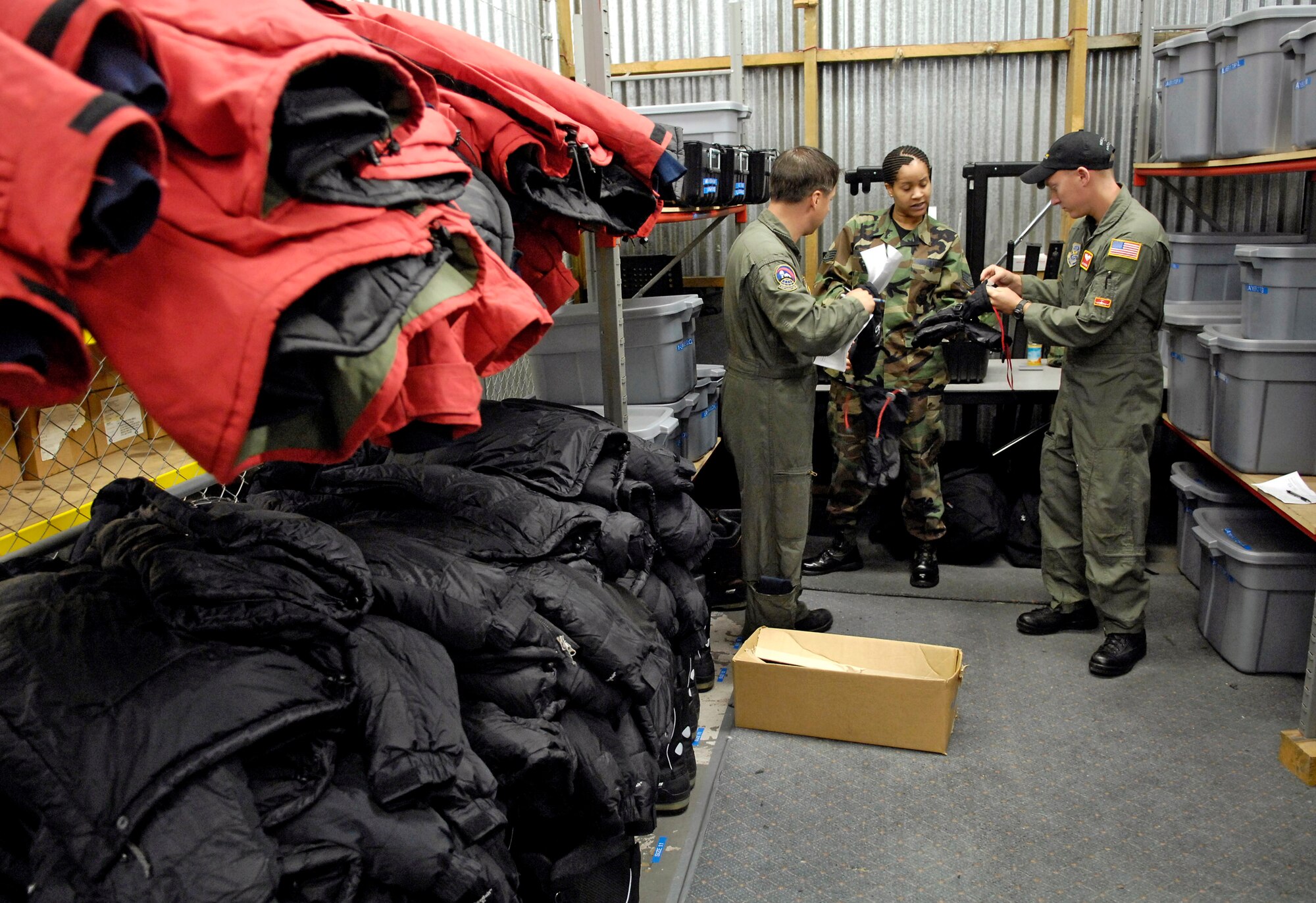 C-17 Globemaster III loadmasters are issued cold weather gear for the upcoming winter fly-in missions to Antarctica at Christchurch, New Zealand, Aug. 19. A C-17 and 31 Airmen from McChord Air Force Base, Wash. will begin the annual winter fly-in augmentation of scientists, support personnel, food and equipment for the U.S. Antarctic Program at McMurdo Station Aug. 20. WinFly is the opening of the first flights to McMurdo station, which closed for the austral winter in February. (U.S. Air Force photo/Tech. Sgt. Shane A. Cuomo) 
