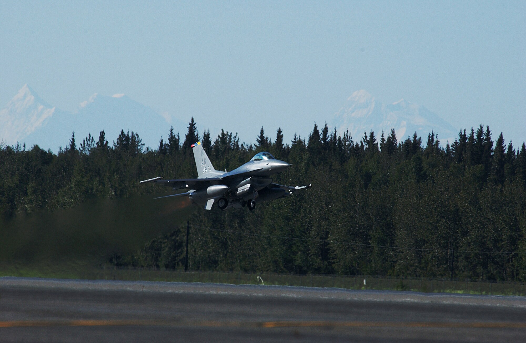 EIELSON AIR FORCE BASE, Alaska -- Brig. Gen. David Scott, 354th Fighter Wing Commander, takes off in a F-16 Fighting Falcon aircraft for his fini flight on Aug. 17 2007. General Scott arrived at Eielson AFB back in Dec. 05 and will be departing in Aug. 07 to a NATO base in Greece as the Deputy Commander of Combined Air Operations Center. (U.S. Air Force Photo by Airman 1st Class Jonathan Snyder)