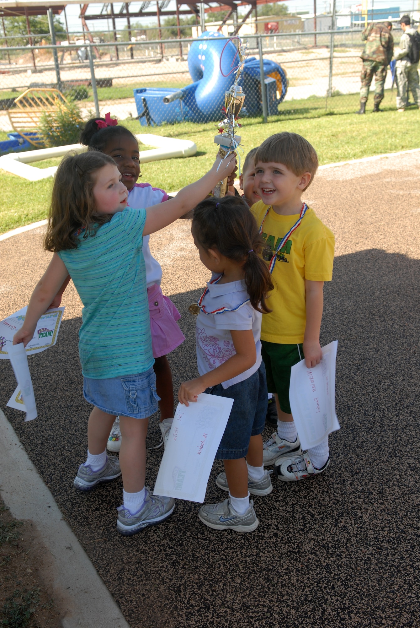 Everyone was a winner at the Goodfellow Air Force Base Child Development Center’s Little Olympics Aug. 10. Each class received a trophy this year. (U.S. Air Force photo by Airman 1st Class Kamaile Chan)