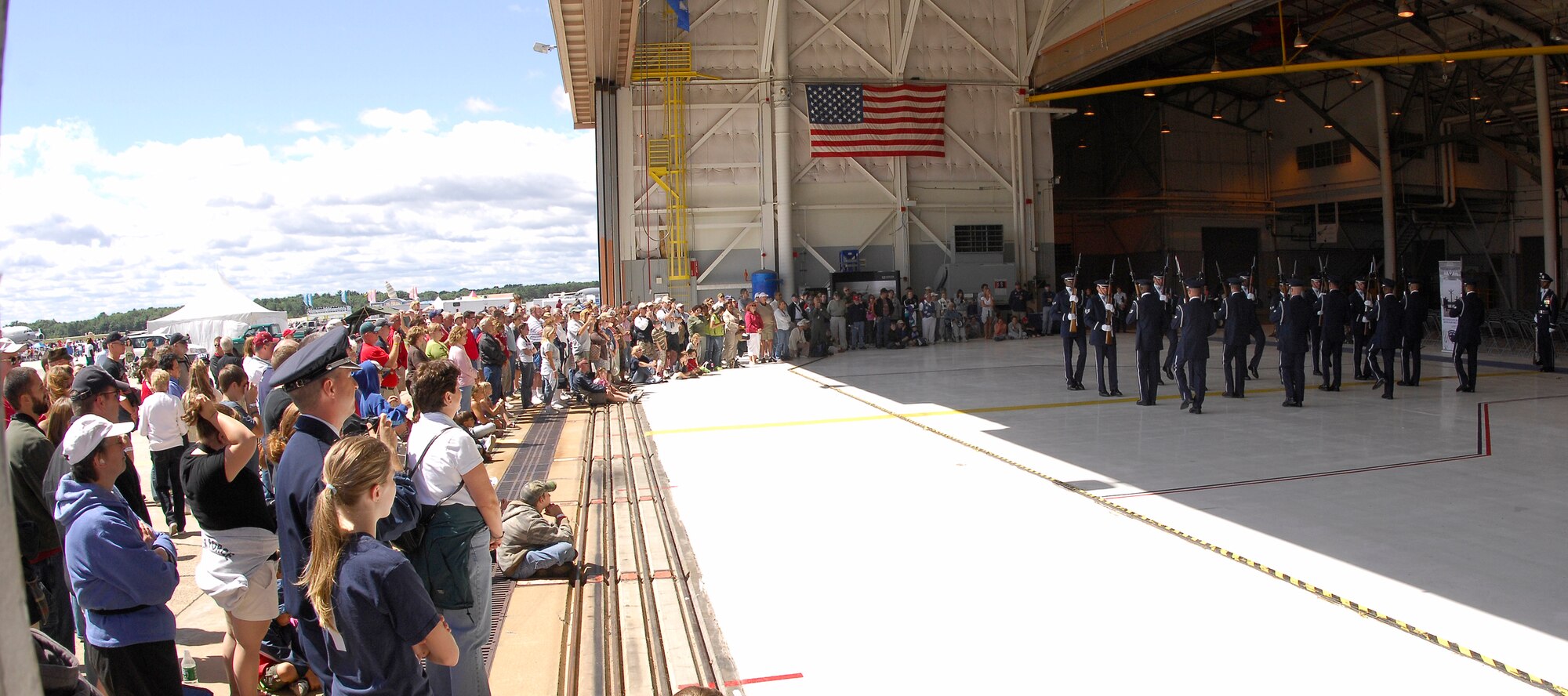 The USAF Honor Guard Drill Team showcases AF precision in New Hampshire during the Wings of Hope Air Show at Pease ANGB. The air show ran from August 18-19 with the Drill Team performing both days supporting New England's Air Force Week events. (U.S. Air Force photo by Airmen 1st Class Alexandre Montes)(Released)