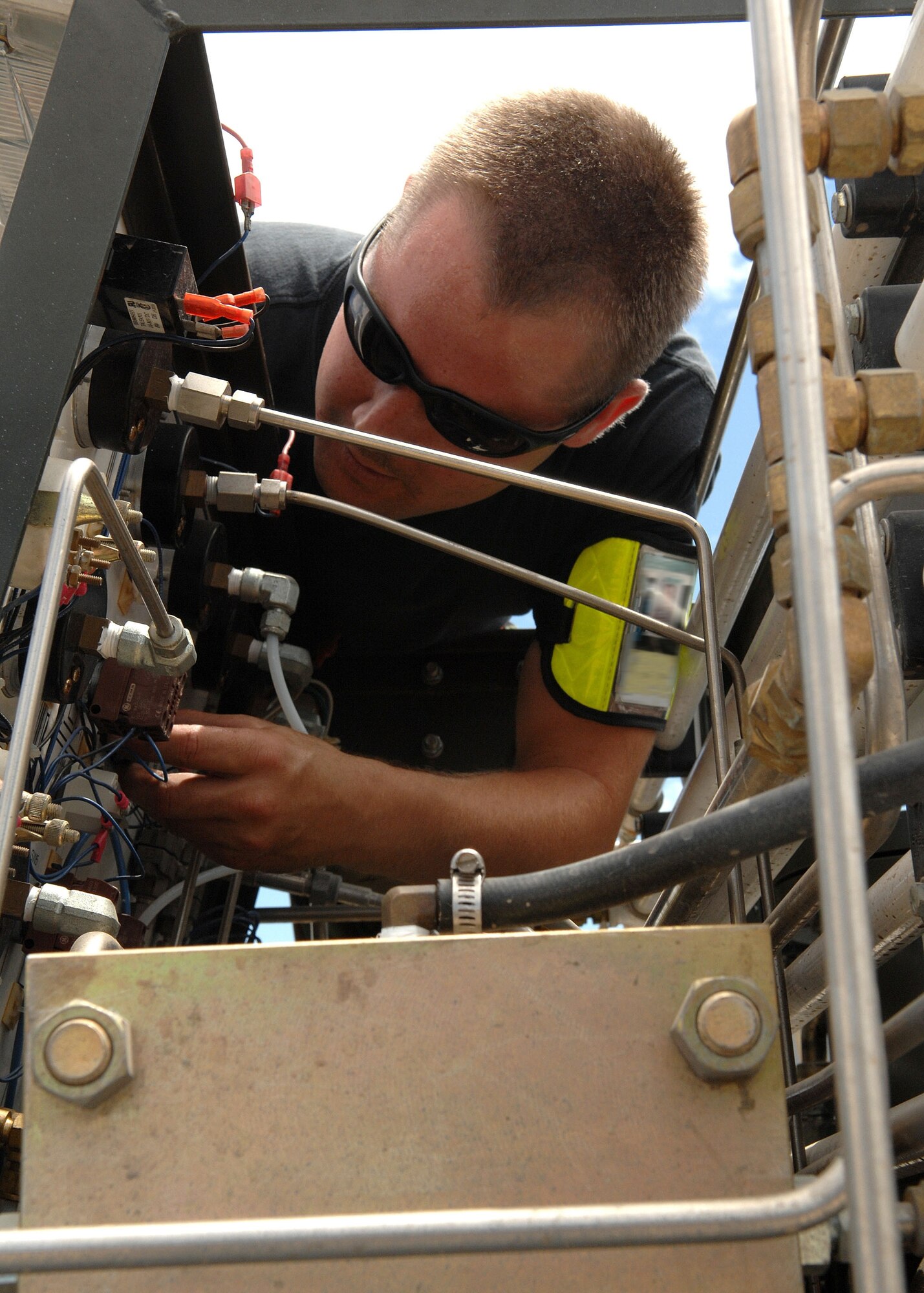 Senior Airman Chester Fowler, 49th Maintenance Squadron, rewires a piece of Aerospace Ground Equipment. (U.S. Air Force photo/Airman 1st Class John Strong)