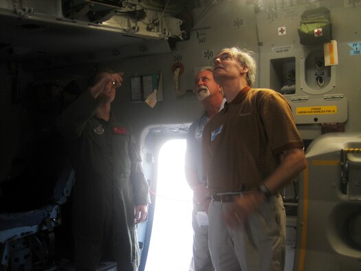 Airman First Class Charlie Gibb explained the role of a loadmaster in the planning and execution phases of C-17 missions to Friends of Hickam members, George Irion and Thomas J. Wogan.  The Friends of Hickam were able to experience a Hickam C-17 up close to better understand its capabilities and importance in local and global missions.  