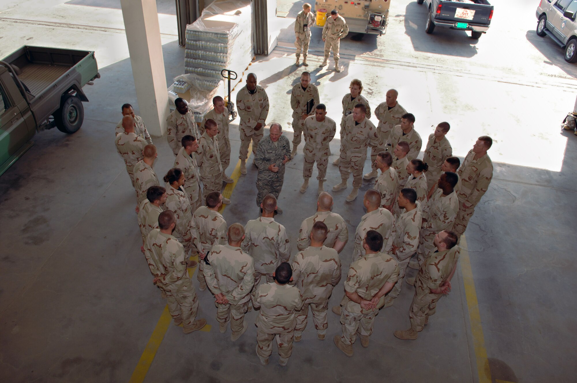 Chaplain (Maj. Gen.) Charles Baldwin, Air Force chief of chaplains (center) speaks with Airmen deployed to the 379th Expeditionary Security Forces Squadron Aug. 13. (U.S. Air Force photo/Master Sgt. Ken Stephens)