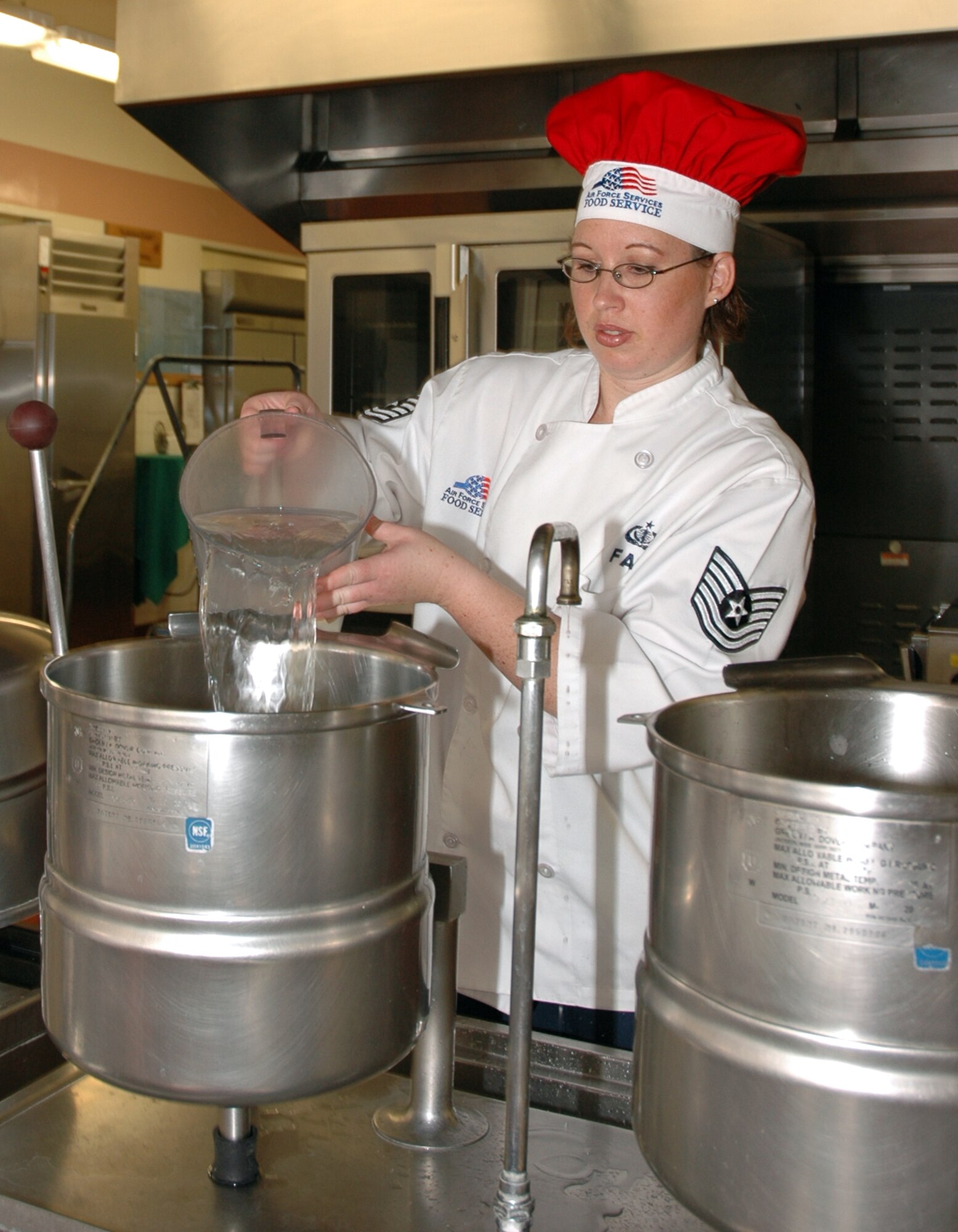 MOUNTAIN HOME AIR FORCE BASE, Idaho -- Tech. Sgt. Cheryl Fair, a shift supervisor at the Wagon Wheel Dining Facility here, prepares potatoes for the lunchtime meal on Aug. 20.  The Wagon Wheel was selected, along with the Trailwinds Flight Kitchen, to represent Air Combat Command in the 2008 John L. Hennessy Trophy competition. (U.S. Air Force photo/ Staff Sgt. Rodney D. Ivey)