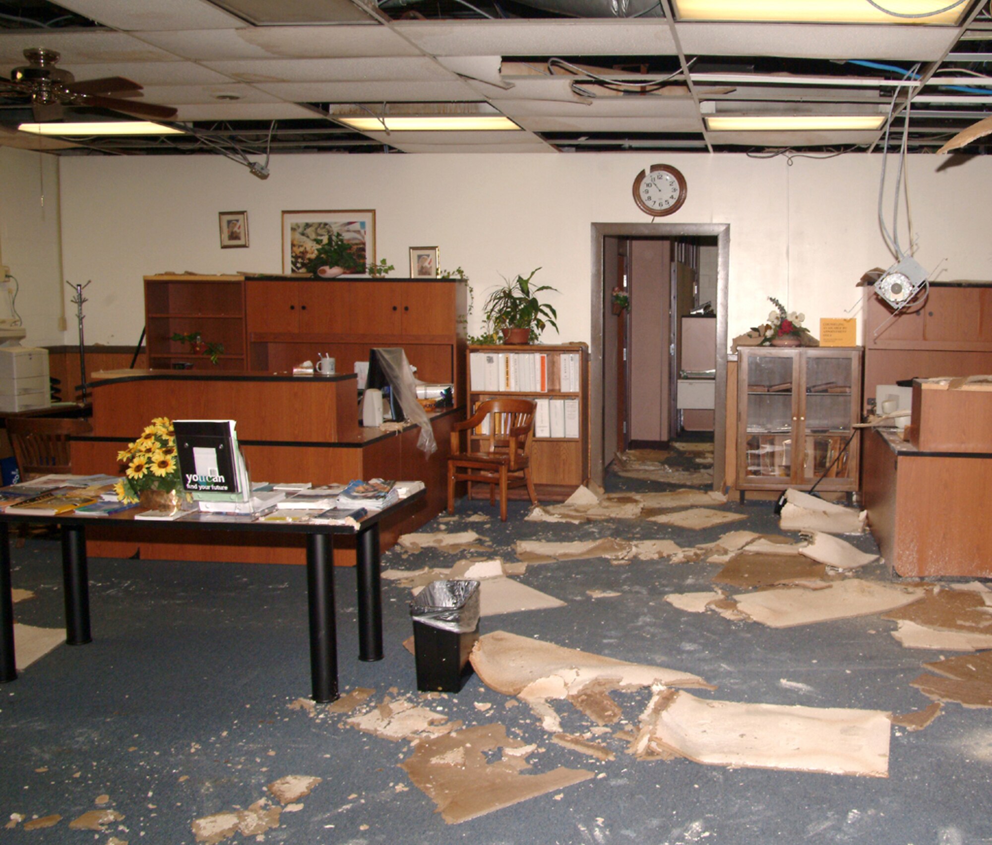 Sablich Center, the heart of base support activities, was uninhabitable after storm water intrusion from the roof and windows.  Offices and agencies have been scattered at several locations while a $6.2 million project repairs the facility.  (U.S. Air Force photo)