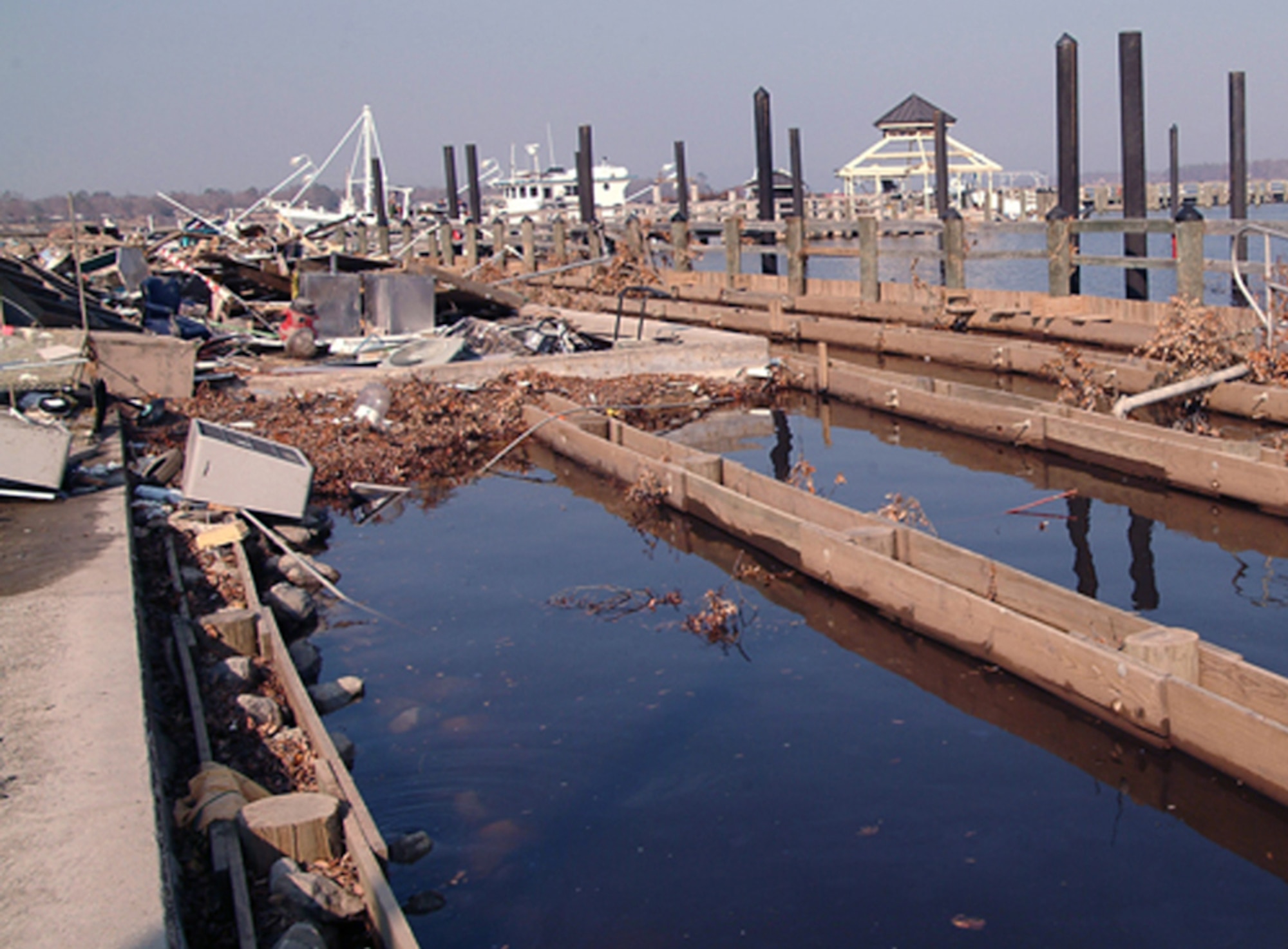 More than 70 percent of the decking and the entire boardwalk at the marina were damaged by the storm surge of more than 16 feet on Biloxi’s Back Bay.  (U.S. Air Force photo)