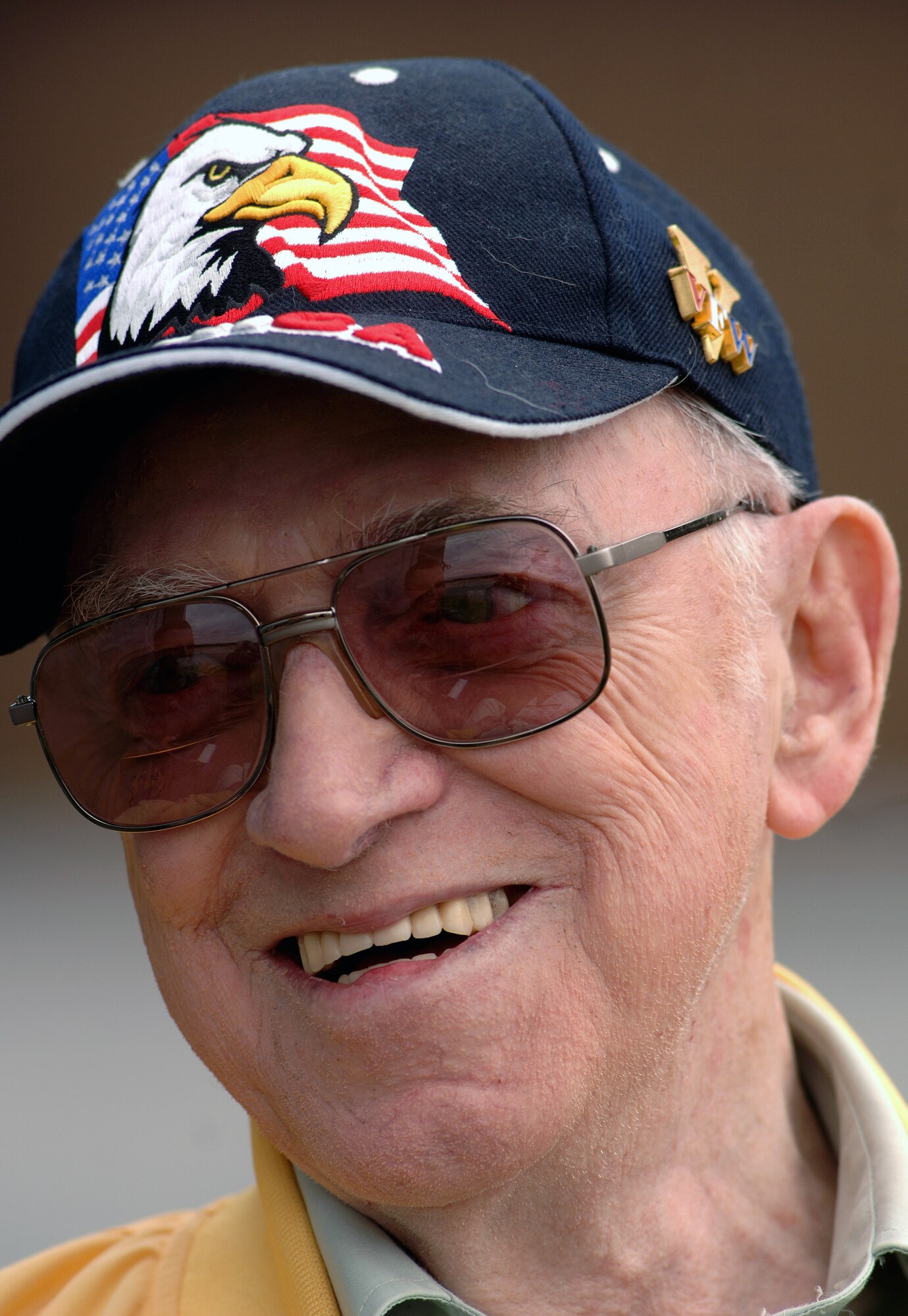 World War II veteran Robert McNally shares stories with media and spectators of his time spent as an aircraft radio operator in the Army Air Corps while aboard the B-25 Mitchell bomber Aug. 19 at Pease Air National Guard Base at Portsmouth, N.H. Mr. McNally, 81, was a guest attending the 2007 Wings of Hope Air Show with hopes of being reunited with old friends. The 2007 Wings of Hope Air Show at Pease ANGB is in conjunction with Air Force Week New England. (U.S. Air Force photo/Staff Sgt. Bennie J. Davis III) 

