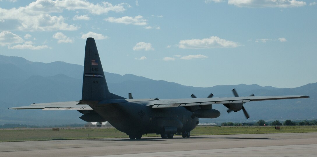 A C-130H3 proceeds down the Peterson Air Force Base, Colo., taxiway for the last time Aug. 20, 2007.  It's new home will be at the 153rd Airlift Wing, Cheyene, Wyo. (U.S. Air Force photo/Maj. James R. Wilson)