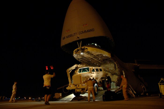 Charleston AFB and Dover AFB members load Mine Resistant Ambush Protected vehicles onto a C-5 Galaxy assigned to the 436th Air Wing, Dover, Air Force Base (AFB), Del. at Charleston AFB, S.C., Aug. 16, 2007. (U.S. Air Force Photo/Staff Sgt. April Quintanilla)