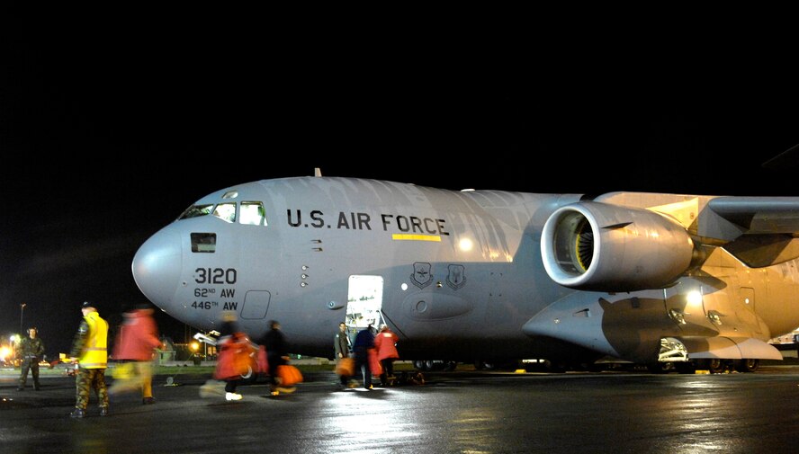 Members of the National Science Foundation load supplies on a C-17 Globemaster III for a winter fly-in mission during Operation Deep Freeze Aug. 20 at Christchurch, New Zealand. A C-17 and 31 Airmen from McChord Air Force Base, Wash., began the annual winter flight in augmentation of scientist, support personnel, food and equipment for the U.S. Antarctic Program at McMurdo Station. WinFly is the opening of the first flights to McMurdo Station, which closed for the austral winter in February. (U.S. Air Force photo/Tech. Sgt. Shane A. Cuomo) 