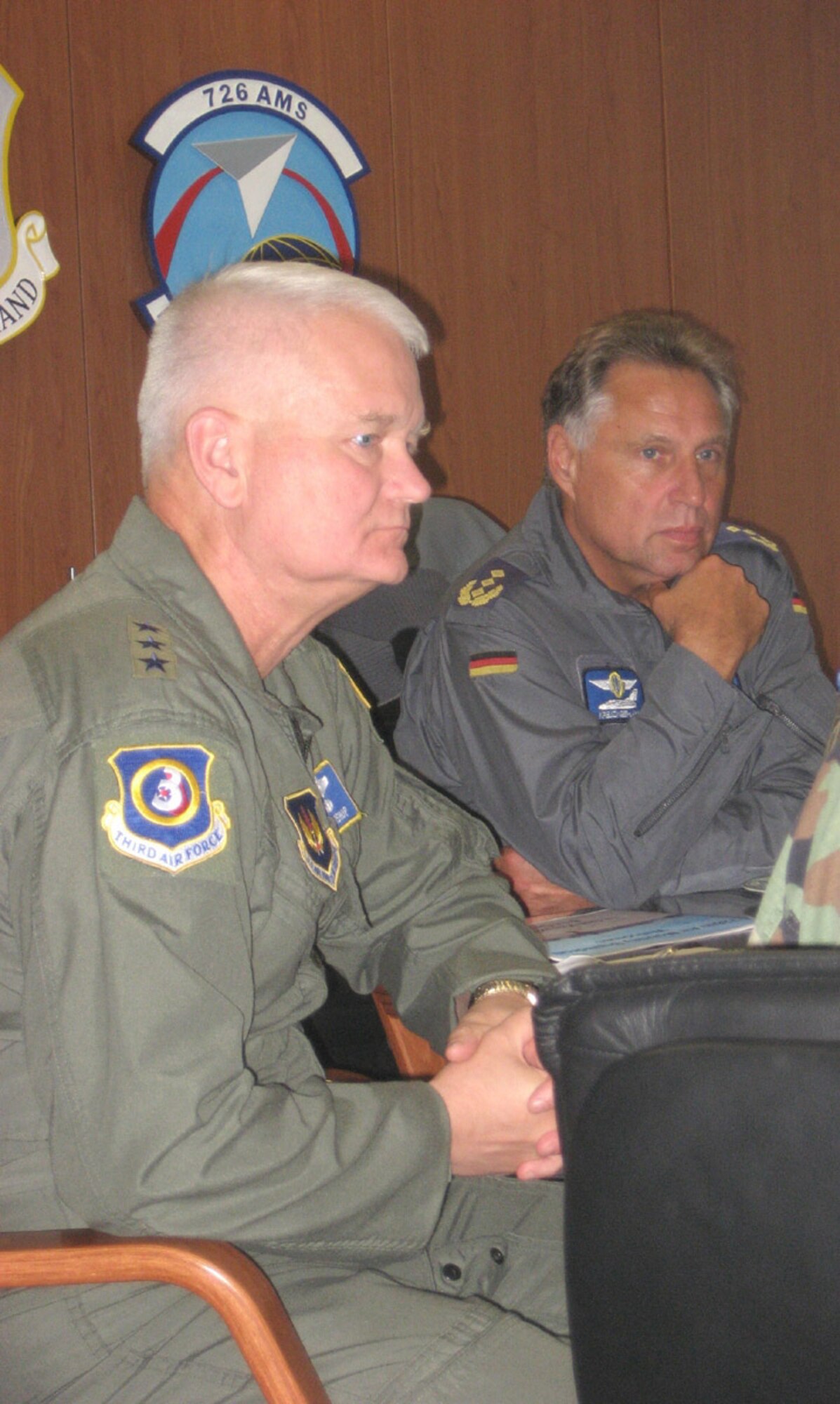 SPANGDAHLEM AIR BASE, Germany – Lt. Gen. Robert Bishop, 3rd Air Force commander, and Lt. Gen. Aarne Kreuzinger-Janik, Commander German Air Force Command, attend a 726th Air Mobility Squadron mission brief Aug. 20 here. General Kreuzinger-Janik also visited Saber Control and the Joint Fires Center of Excellence. The purpose of the general’s visit was for 3rd Air Force orientation and open discussion on interoperability and bolster NATO partnership. (U.S. Air Force photo/Staff Sgt. Andrea Knudson)