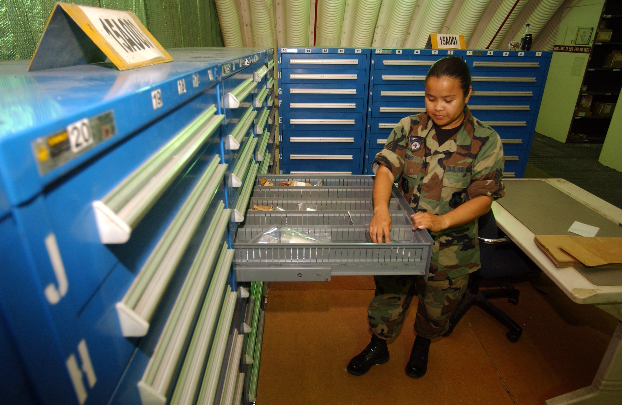 KUNSAN AIR BASE, South Korea — Staff Sgt. Gladys Romo, 8th Logistics Readiness Squadron, conducts a physical inventory of parts at the Aircraft Parts Store here Aug. 9. (U.S. Air Force photo/Senior Airman Steven R. Doty) 