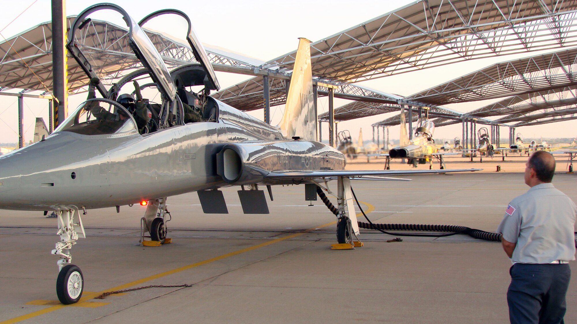 2nd Lt. Clay Bird, Introduction to Fighter Fundamentals student, and Capt. Nathan Thompson, 3rd Fighter Training Squadron flight commander, prepare to take off in an AT-38 Wednesday for the first sortie of the inaugural IFF class at Vance.  The class started Aug. 13 and will conclude in eight weeks. (Air Force photo by Capt. Tony Wickman)