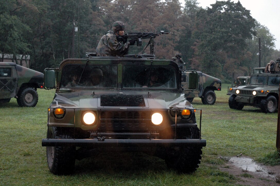 Students in the Air Force Phoenix Warrior Training Course 07-6 move out for a convoy during training for the course Aug. 21 on a range at Fort Dix, N.J.  The course focuses on contingency skills for Air Force security forces and is taught by the U.S. Air Force Expeditionary Center's 421st Combat Training Squadron.  (U.S. Air Force Photo/Tech. Sgt. Scott T. Sturkol)