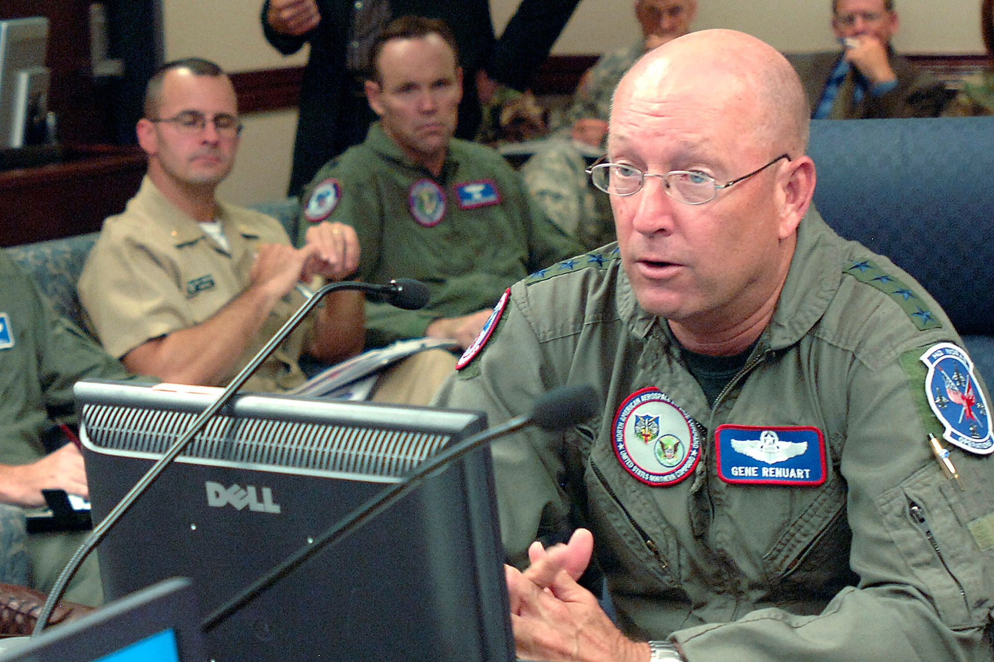 Gen. Victor E. Renuart Jr. discusses the progress of several ongoing missions during the commander's update briefing at North American Aerospace Defense Command and U.S. Northern Command headquarters Aug. 20 at Peterson Air Force Base, Colo. General Renuart is the commander of NORAD and USNORTHCOM. In August, the two military commands have supported the space shuttle launch and landing, recovery efforts at the collapsed bridge in Minneapolis, rescue operations at Utah's Crandall Canyon mine, Russian bomber monitoring, and Hurricane Dean response preparations. (U.S. Army photo/Sgt. 1st Class Gail Braymen)