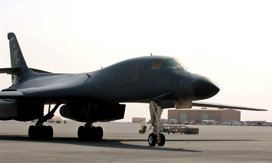 An Air Force B-1B Lancer awaits its next mission at a base in Southwest Asia.  B-1s fly close-air-support missions for both Operation Enduring Freedom and Operation Iraqi Freedom.   (Air Force photo by Master Sgt. Ken Stephens) 