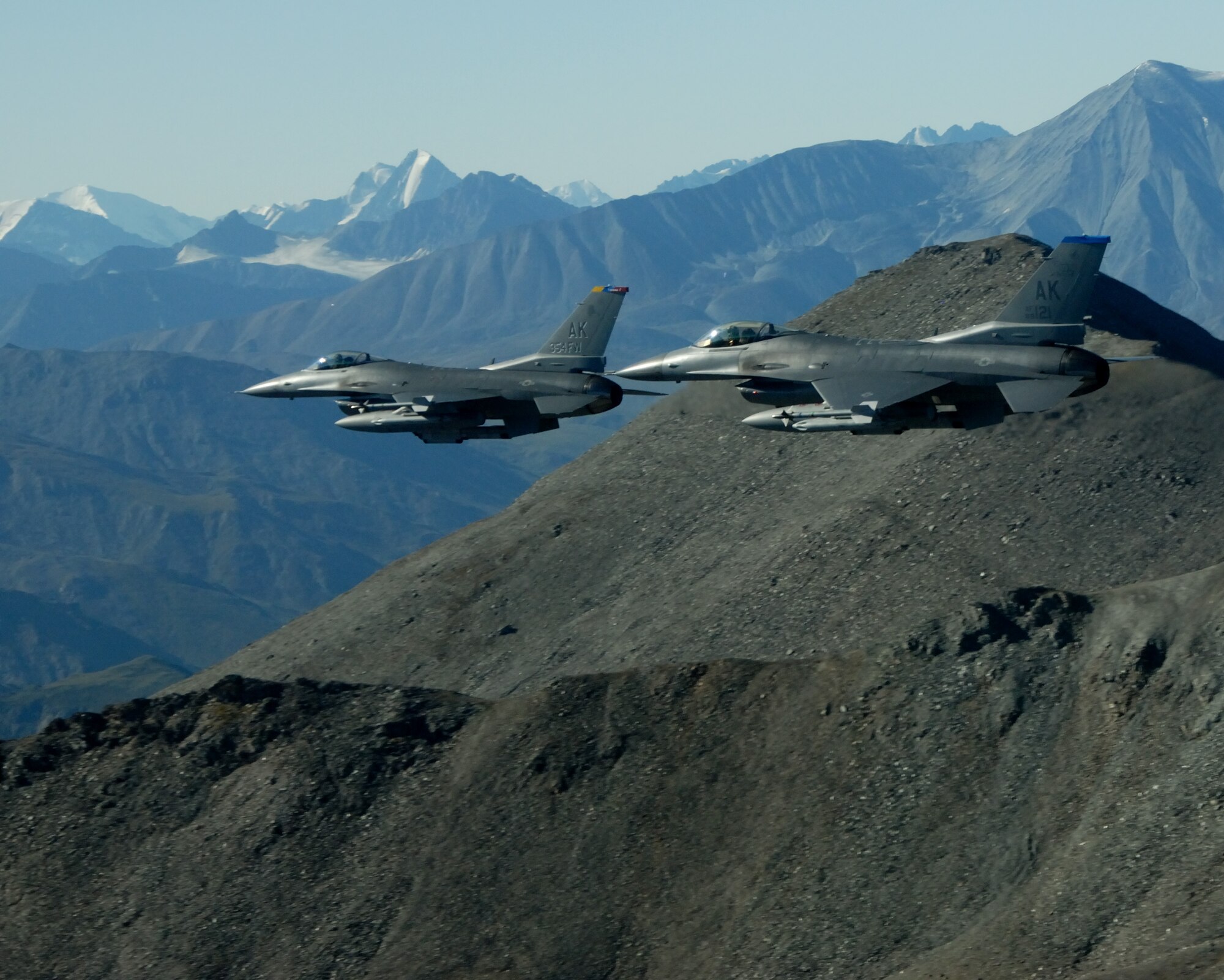 EIELSON AIR FORCE BASE, Alaska -- Brig. Gen. David Scott, 354th Fighter Wing Commander, flies formation over Mt Hayes in a F-16 Fighting Falcon aircraft during his fini flight on Aug. 17. General Scott arrived at Eielson AFB back in Dec. 05 and will be departing in Aug. 07 to a North Atlantic Treaty Organization base in Greece as the Deputy Commander of Combined Air Operations Center. (U.S. Air Force Photo by Master Sgt Rob Wieland)
