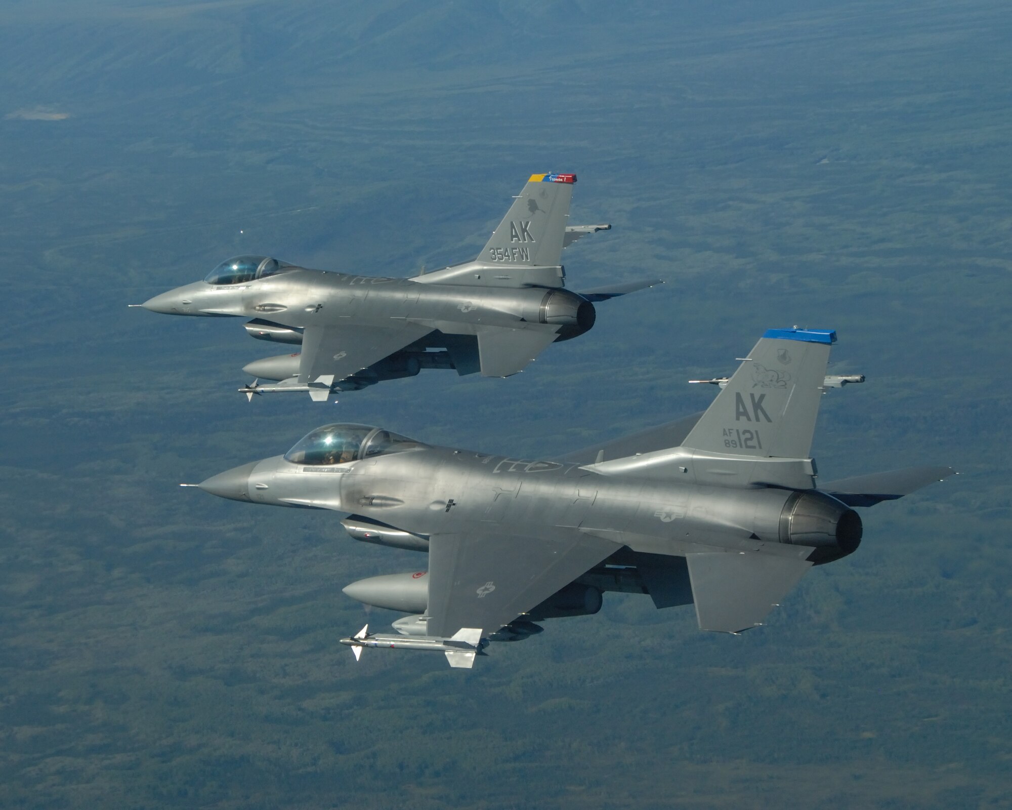 EIELSON AIR FORCE BASE, Alaska -- Brig. Gen. David Scott, 354th Fighter Wing Commander, flies formation in a F-16 Fighting Falcon aircraft during his fini flight on Aug. 17. General Scott arrived at Eielson AFB back in Dec. 05 and will be departing in Aug. 07 to a North Atlantic Treaty Organization base in Greece as the Deputy Commander of Combined Air Operations Center. (U.S. Air Force Photo by Master Sgt Rob Wieland)