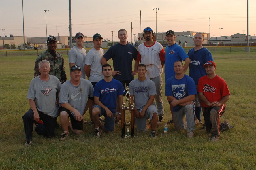 The 7th CES/CONS team defeated the 317th OSS 13-3 in the second game to secure the base softball championship. The 317th OSS won the first game 13-10. (U.S. Air Force photo by Airman 1st Class Felicia Juenke)