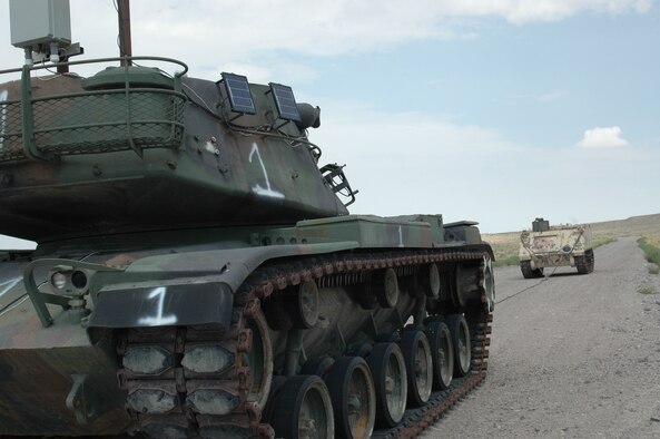 A mobile, unmanned tank was designed and set-up by range personnel to serve a target for precision bombs deployed during the Weapons System Evaluation Program. The program, better known as Combat Hammer, analyzes the bomb from the time it is built to the time it is deployed to determine how successful it might be in combat. (U.S. Air Force photo)