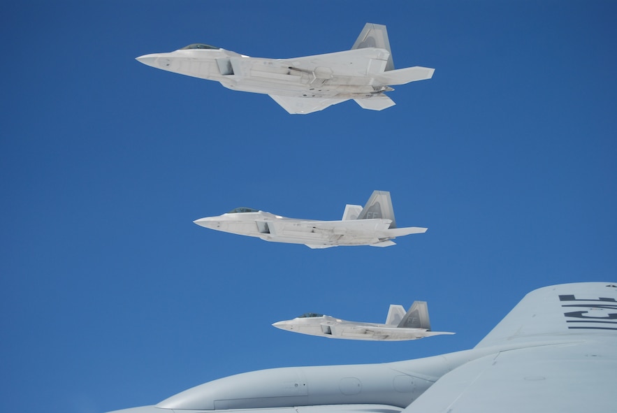 F-22 Raptors from the 1st Fighter Wing at Langley AFB, Va. soar over the Utah Test and Training Range during the Weapons System Evaluation Program Aug. 12-23.  The program, better known as ?Combat Hammer,? analyzes the bomb from the time it is built to the time it is deployed to determine how successful it might be in combat.