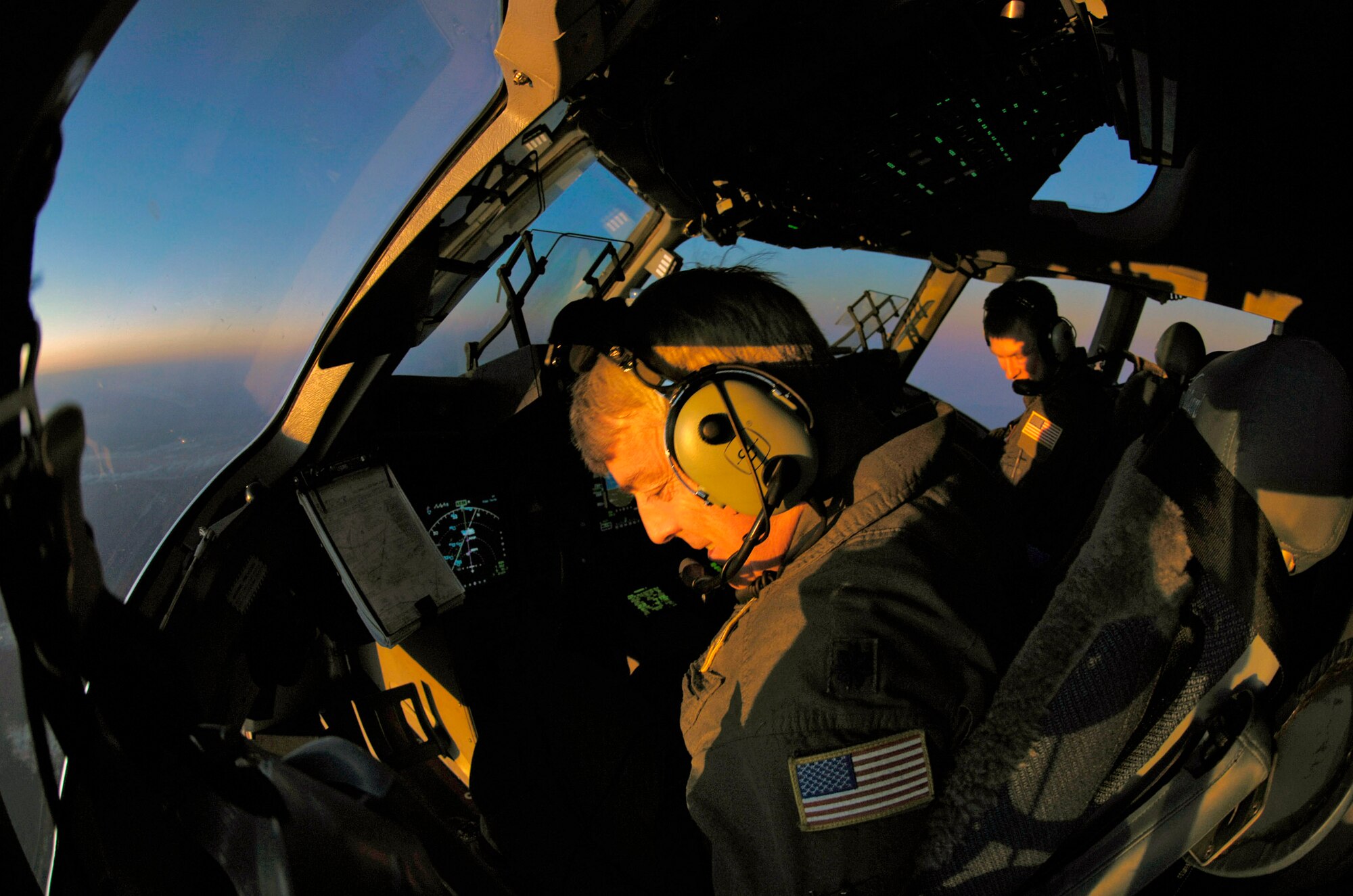 Lt. Col. Merrill Murphy and Capt. Erin Montague fly a C-17 Globemaster III back to Christchurch, New Zealand, after a winter fly-in mission for Operation Deep Freeze to Antarctica Aug. 20. A C-17 and 31 Airmen from McChord Air Force Base, Wash., flew an augmentation of scientists, support staff, food and equipment for the U.S. Antarctic Program at McMurdo Station. (U.S. Air Force photo/Tech. Sgt. Shane A. Cuomo) 

