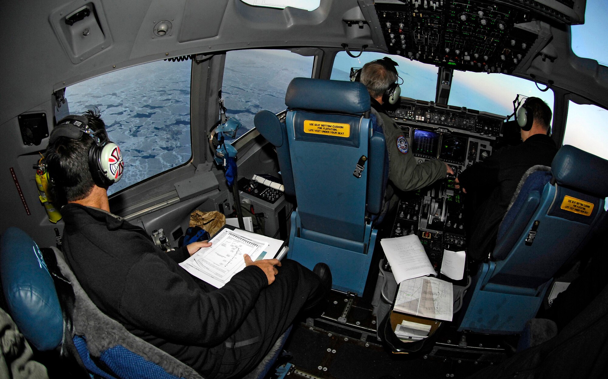 Pilots fly a C-17 Globemaster III during a winter fly-in mission for Operation Deep Freeze to Antarctica Aug. 20. A C-17 and 31 Airmen from McChord Air Force Base, Wash., are flying in an augmentation of scientists, support staff, food and equipment for the U.S. Antarctic Program at McMurdo Station. (U.S. Air Force photo/Tech. Sgt. Shane A. Cuomo) 
