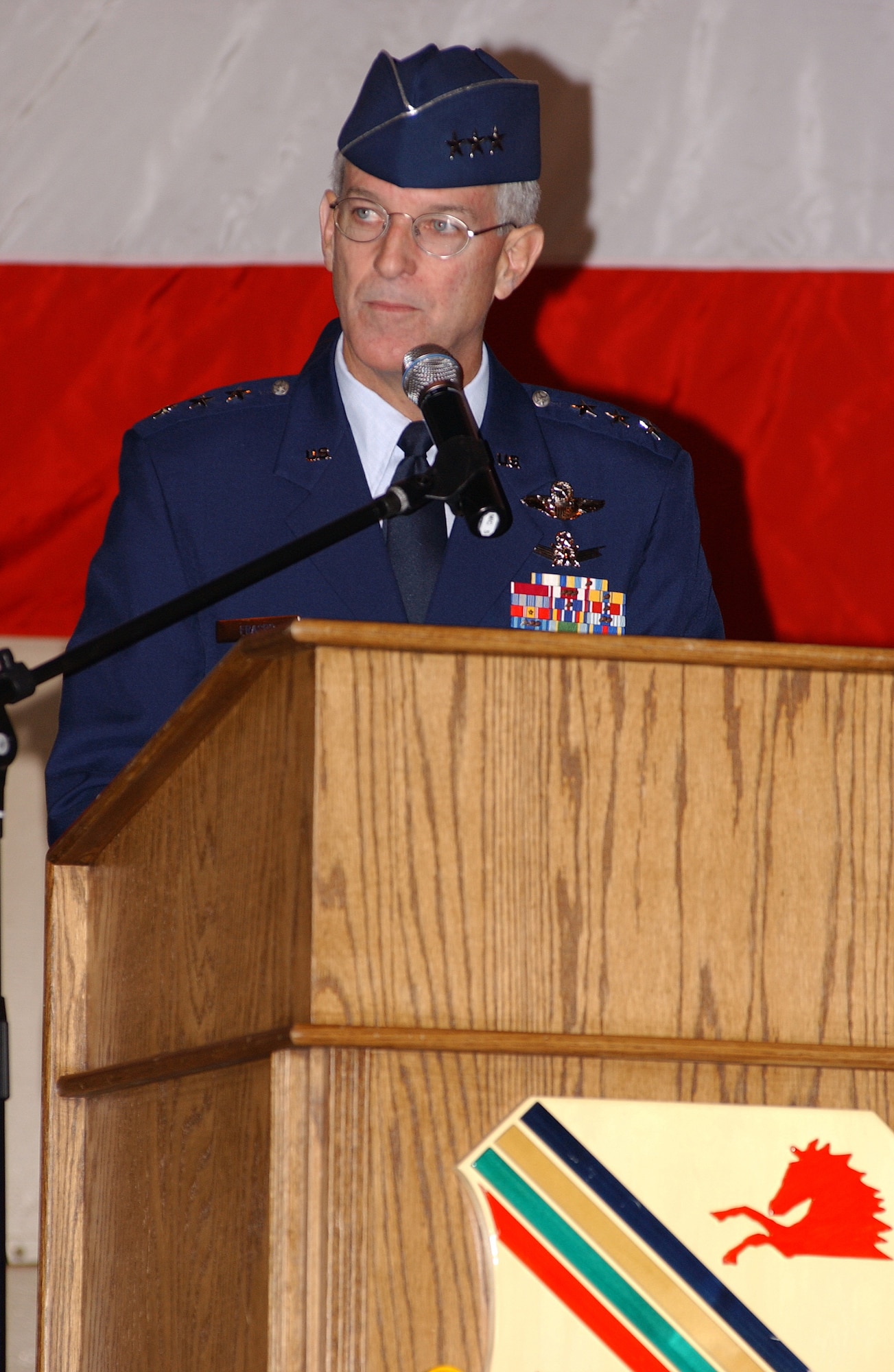 EIELSON AIR FORCE BASE, Alaska -- Lt. Gen. Douglas Fraser, 11th Air Force commander, speaks to the Iceman Team during the 354th Fighter Wing change of command ceremony Aug. 22 at the Thunderdome. General Fraser passed the guidon from Brig. Gen. Dave Scott to Brig. Gen. Mark Graper. (U.S. Air Force Photo by Airman 1st Class Jonathan Snyder)(Released)