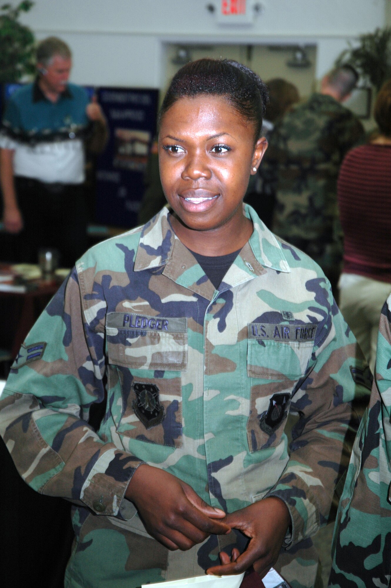 VANDENBERG AIR FORCE BASE--The Vandenberg education center hosted an education fair that allowed members of team Vandenberg to find out more about educational and career oppurtunities. Airman 1st Class Ieshia Pledger listens as she learns how she can finish her CCAF. (US Air Force photo by Airman 1st Class Wesley Carter) 